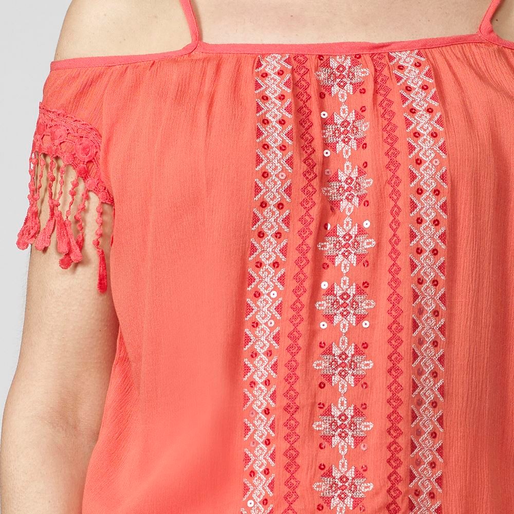 Fluid bamboo blouse with round neckline and short sleeves with bare shoulders with embroidered detail and contrasting sequins on the front and hem finished with an elastic band in Coral color for Women