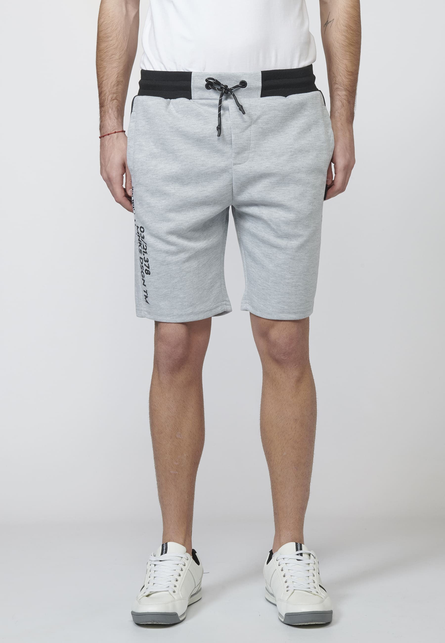 PANTALÓN CORTO JOGGER INTERLOCK con Tres Bolsillos y Cintura Elástica Ajustable para Hombre 1