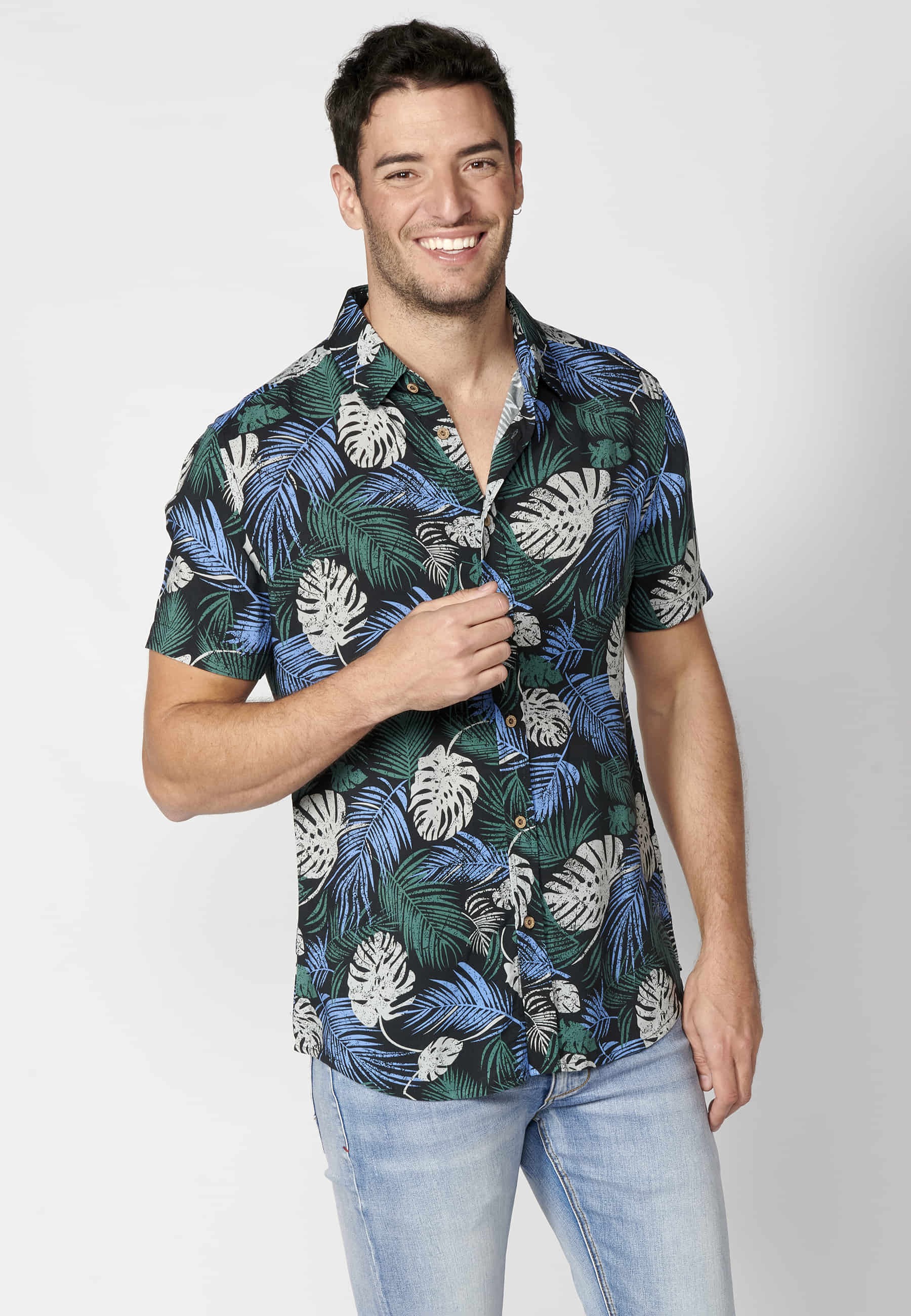Green short-sleeved shirt with tropical print for Men