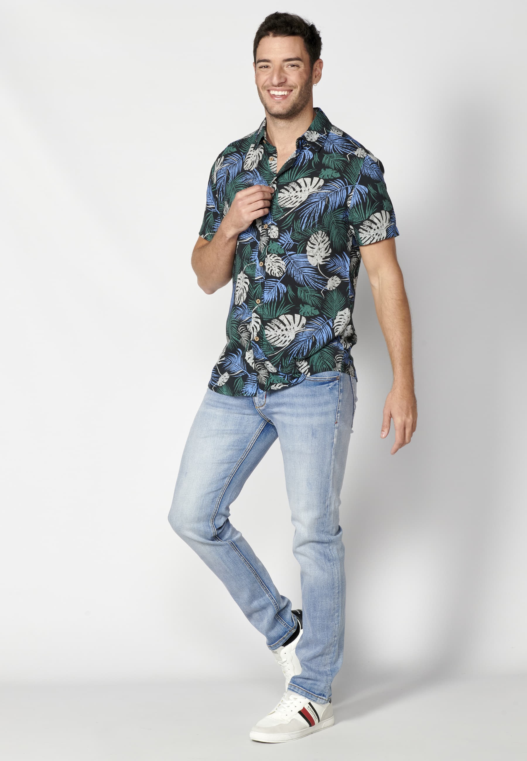 Green short-sleeved shirt with tropical print for Men