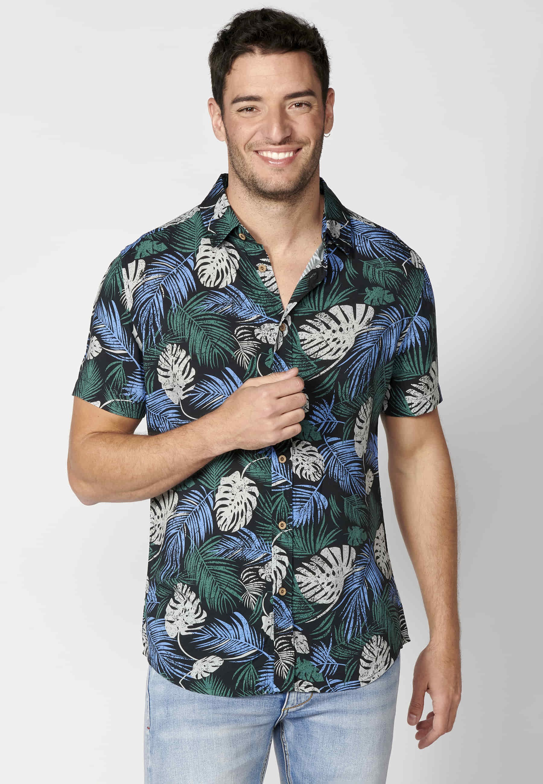 Green short-sleeved shirt with tropical print for Men
