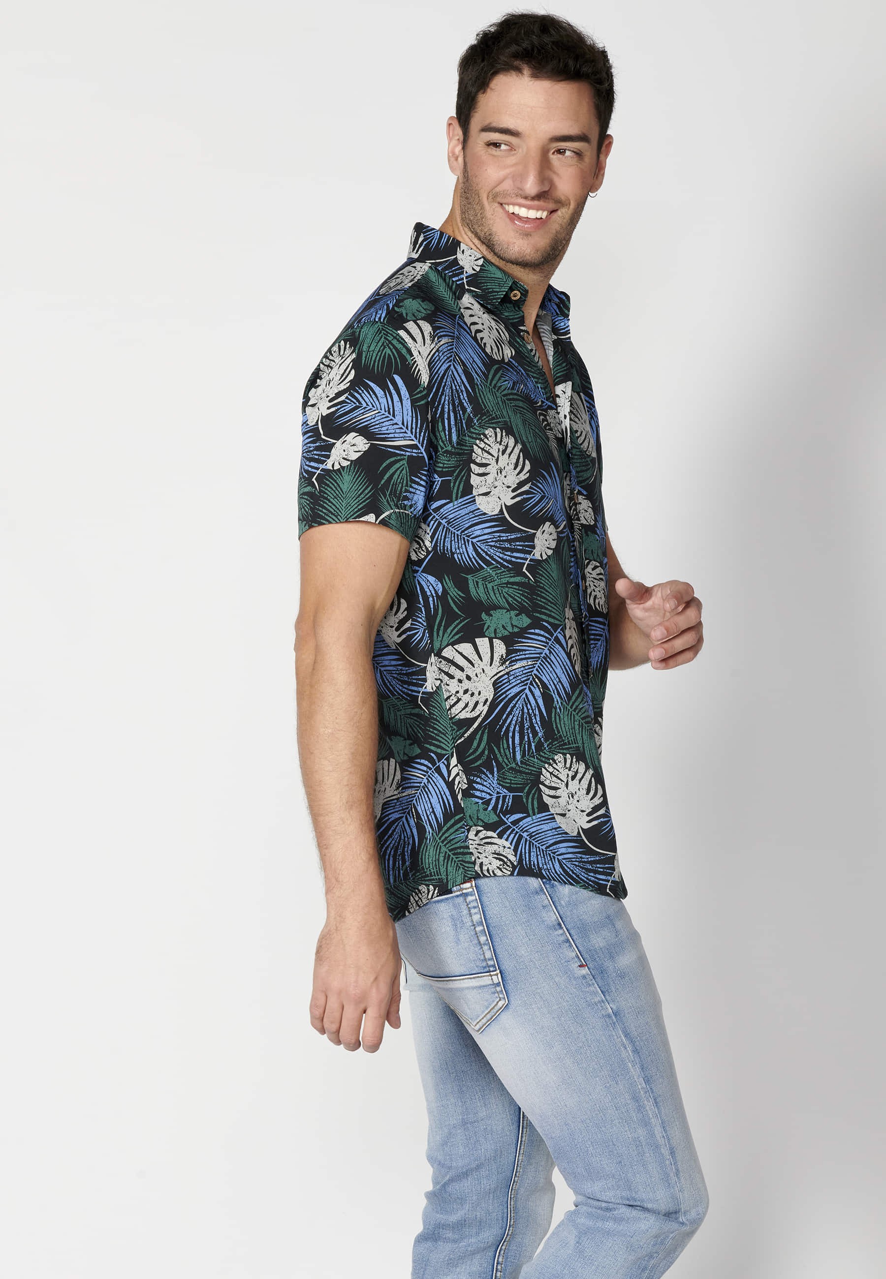 Green short-sleeved shirt with tropical print for Men