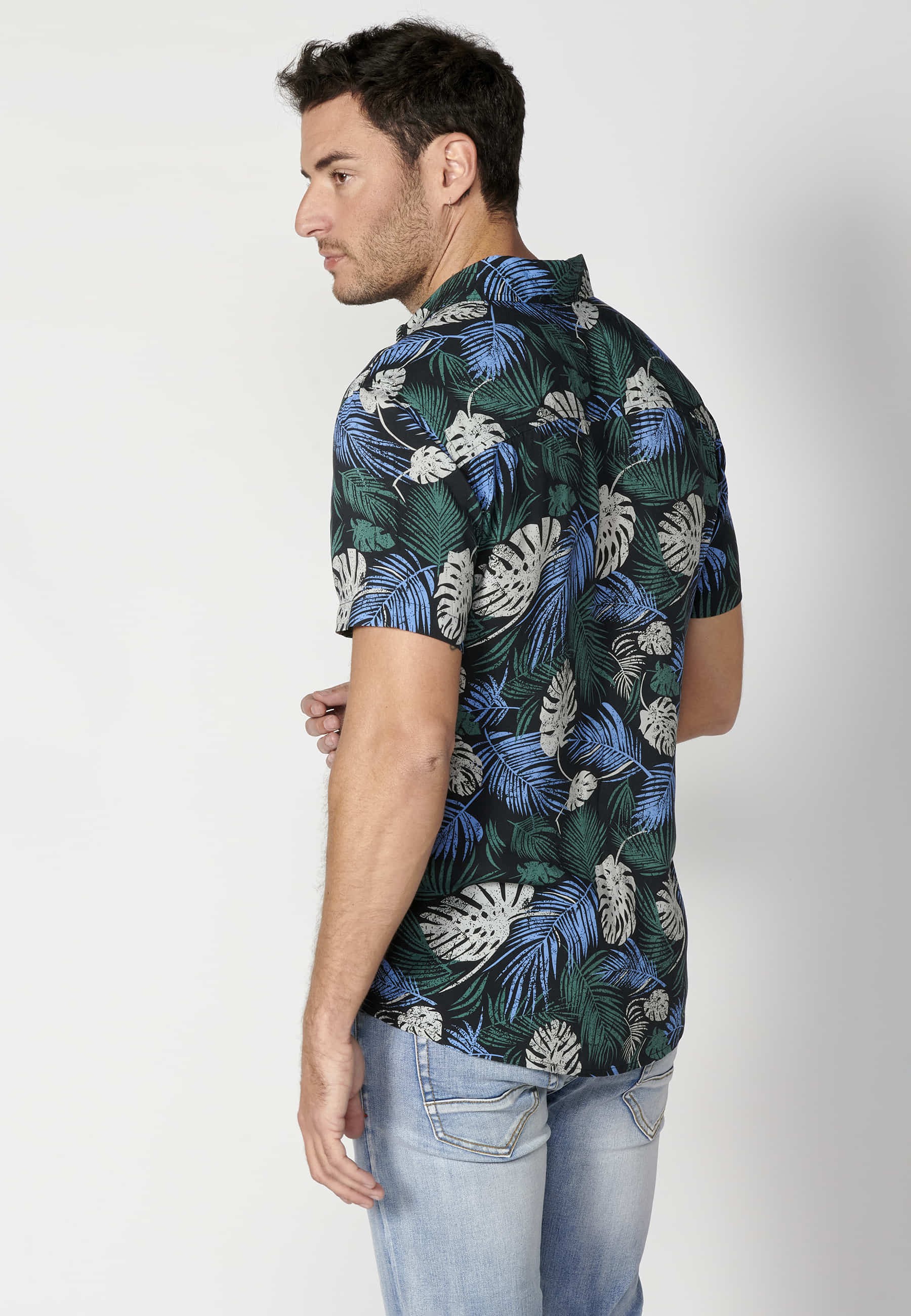 Green short-sleeved shirt with tropical print for Men
