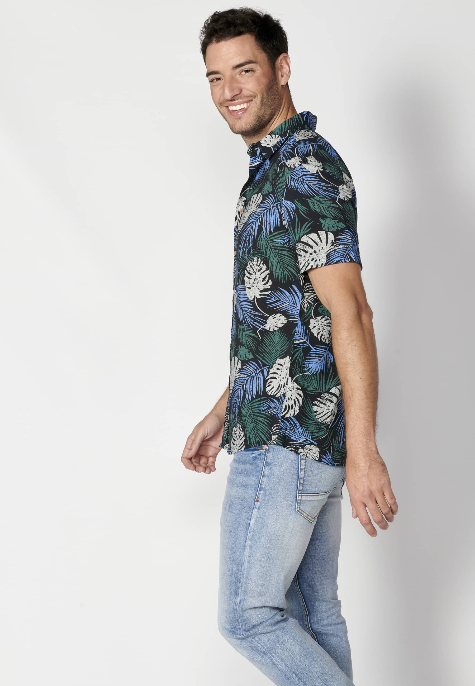 Green short-sleeved shirt with tropical print for Men