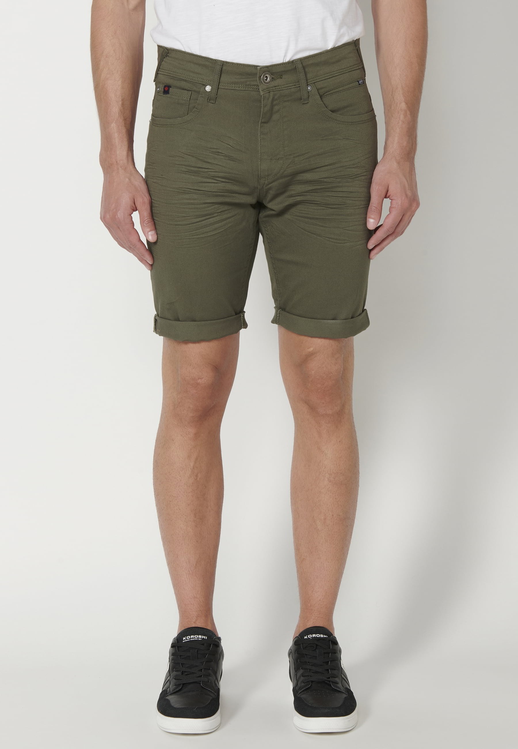 Green shorts with five pockets for Men