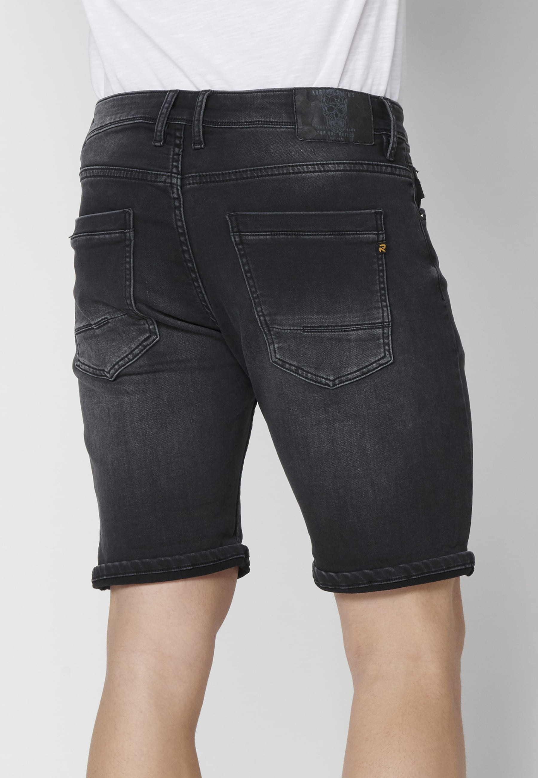 Black regular fit stretch denim bermuda shorts for Men