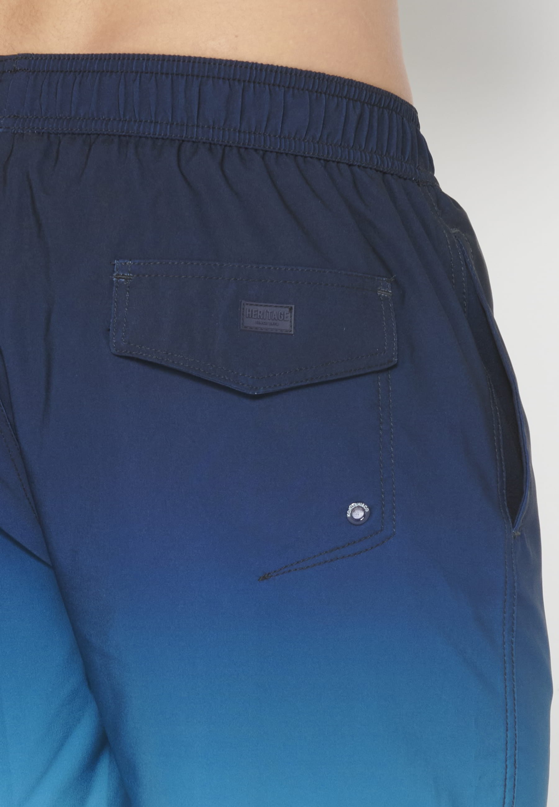 Short swimsuit with three Blue Pockets for Men