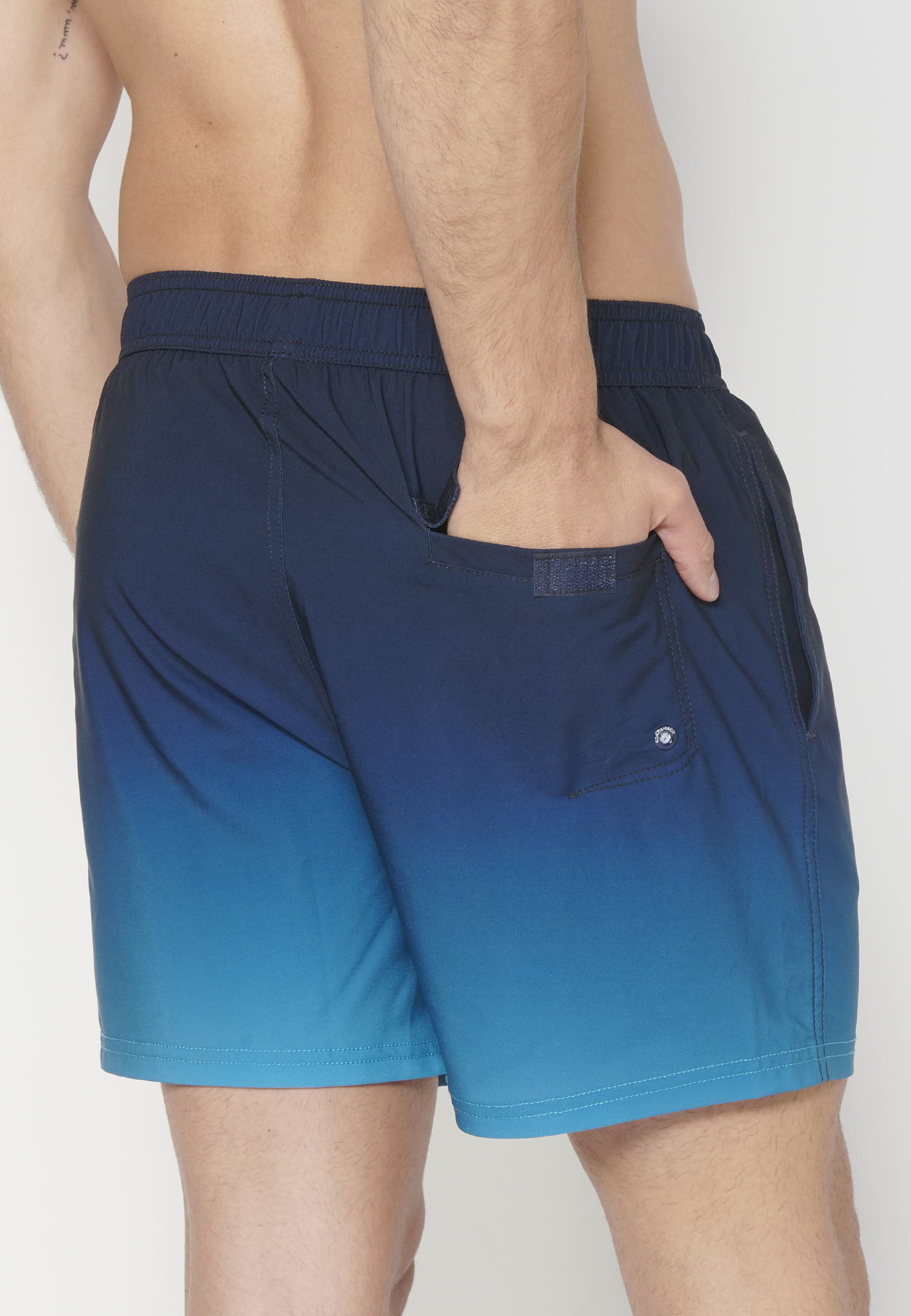 Short swimsuit with three Blue Pockets for Men