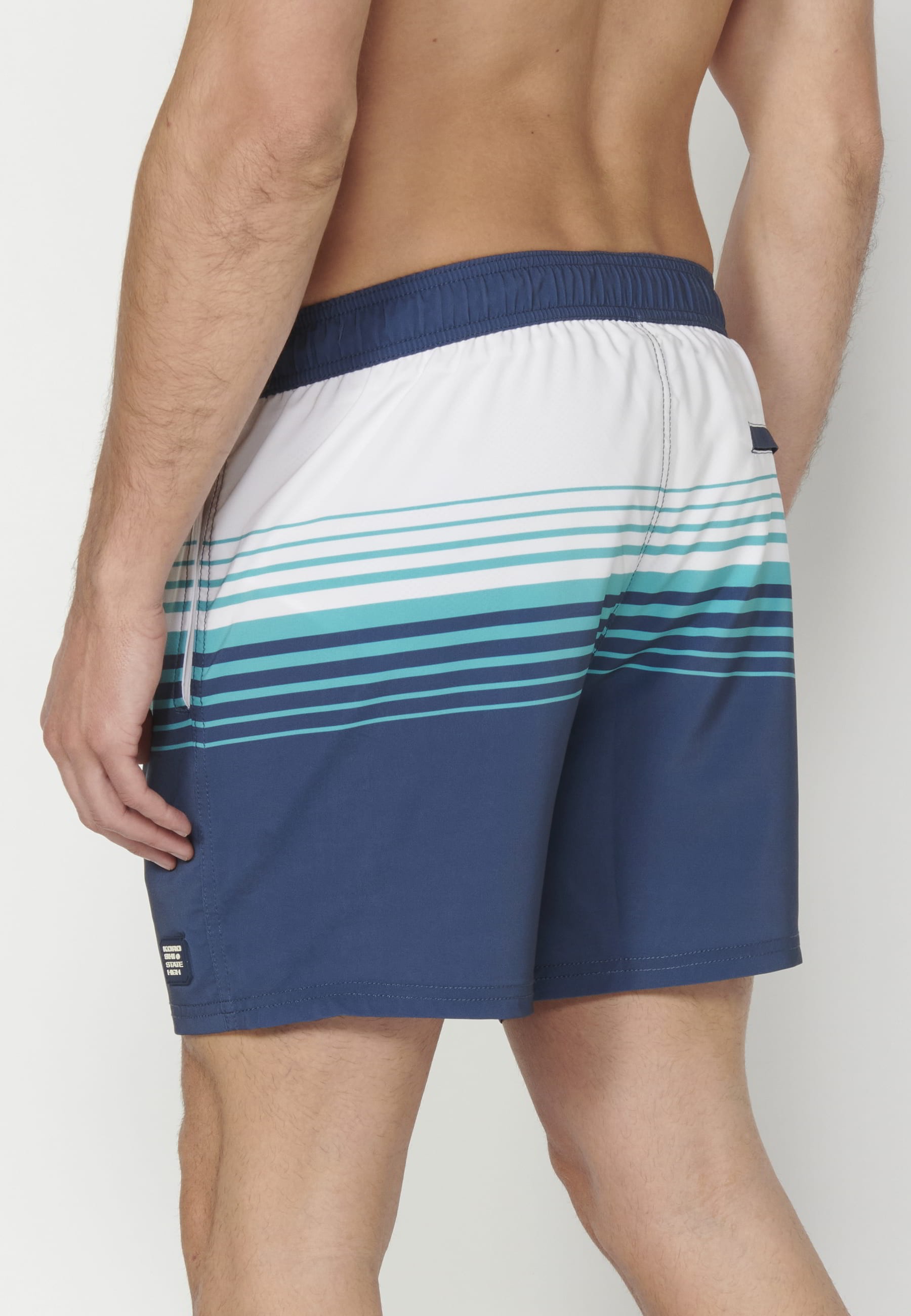 Short swimsuit with three Green Pockets for Men