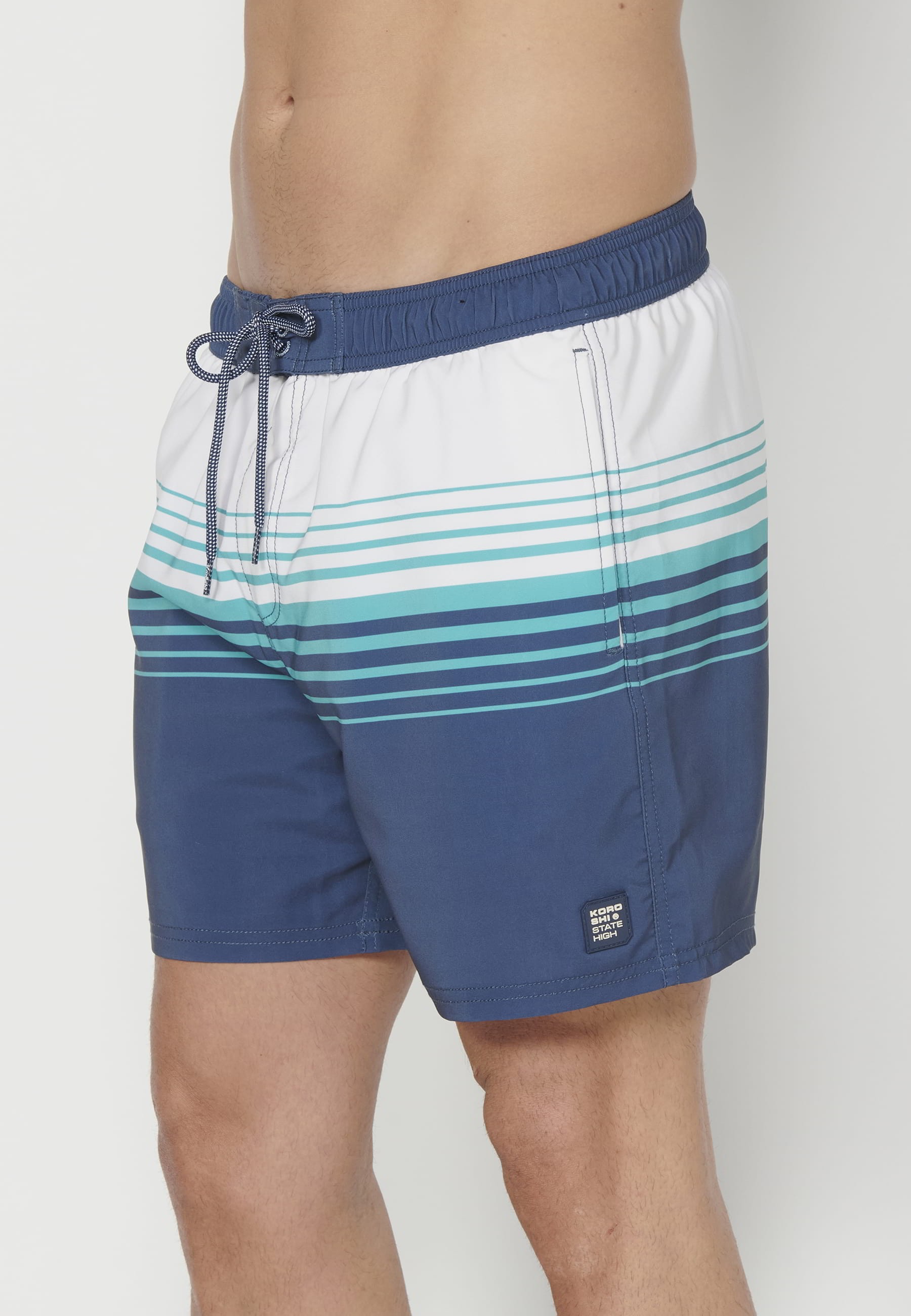 Short swimsuit with three Green Pockets for Men