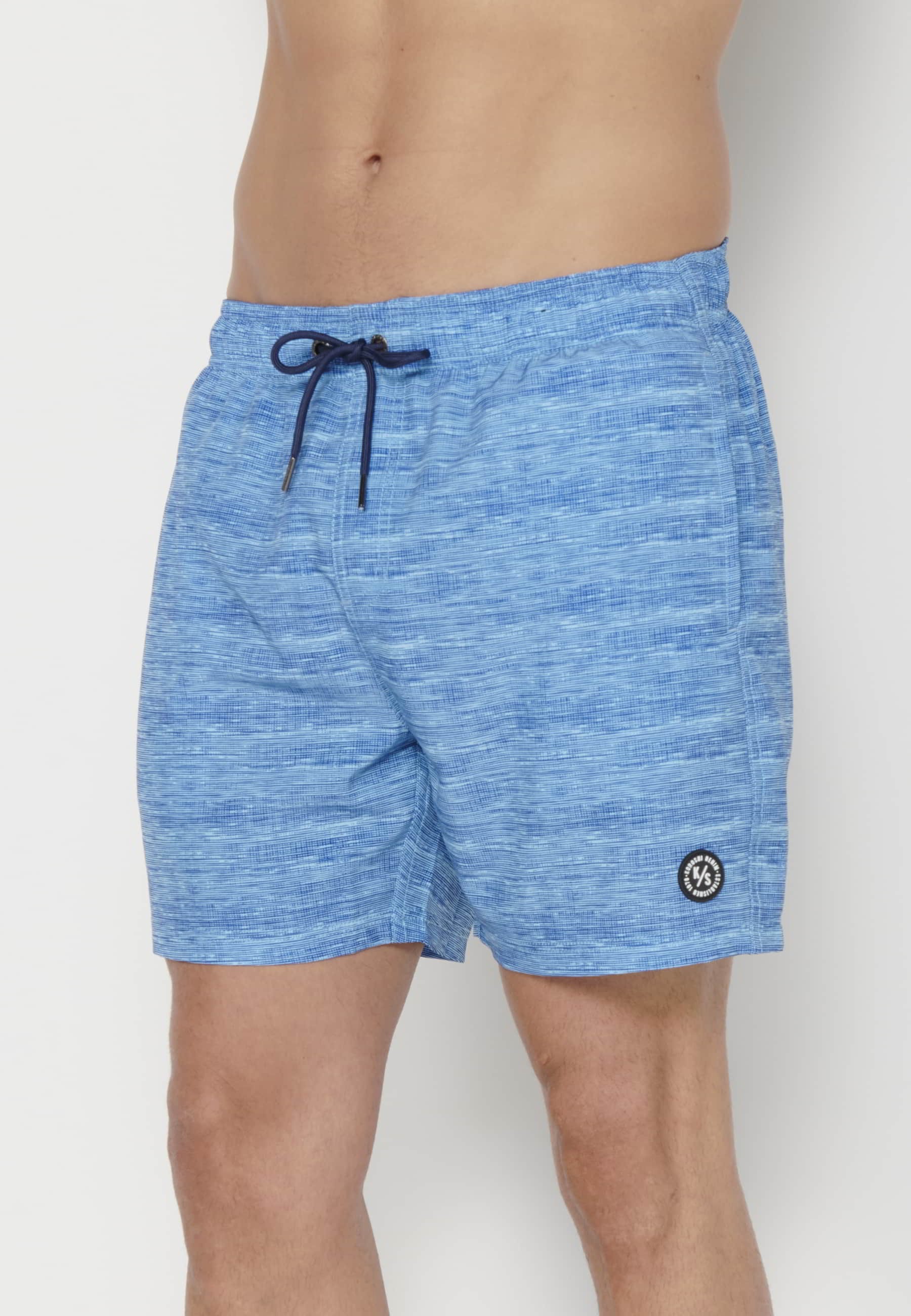 Short swimsuit with three Pockets in Aqua Blue color for Men