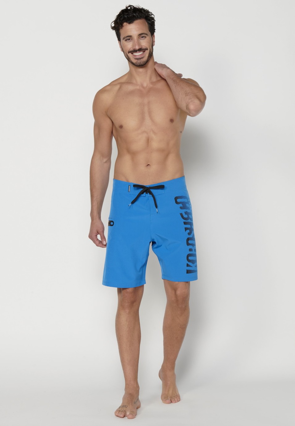 Bañador corto estilo surfero con tres bolsillos color azul para hombre | Ropa Casual