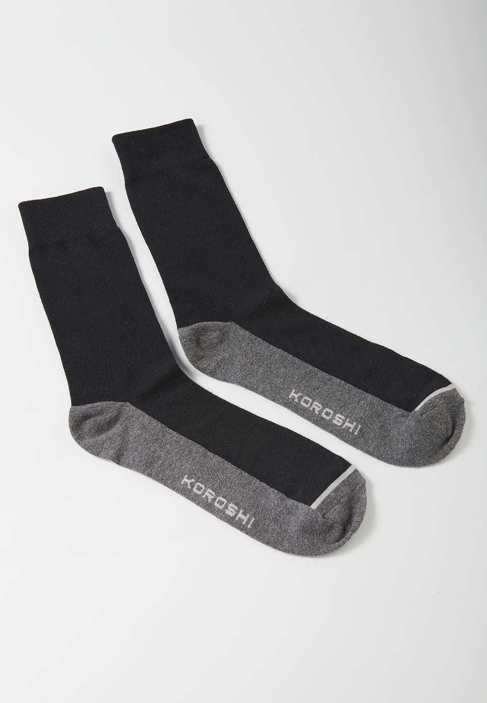 Packung mit 7 Socken in verschiedenen Farben über dem Knöchel für Herren