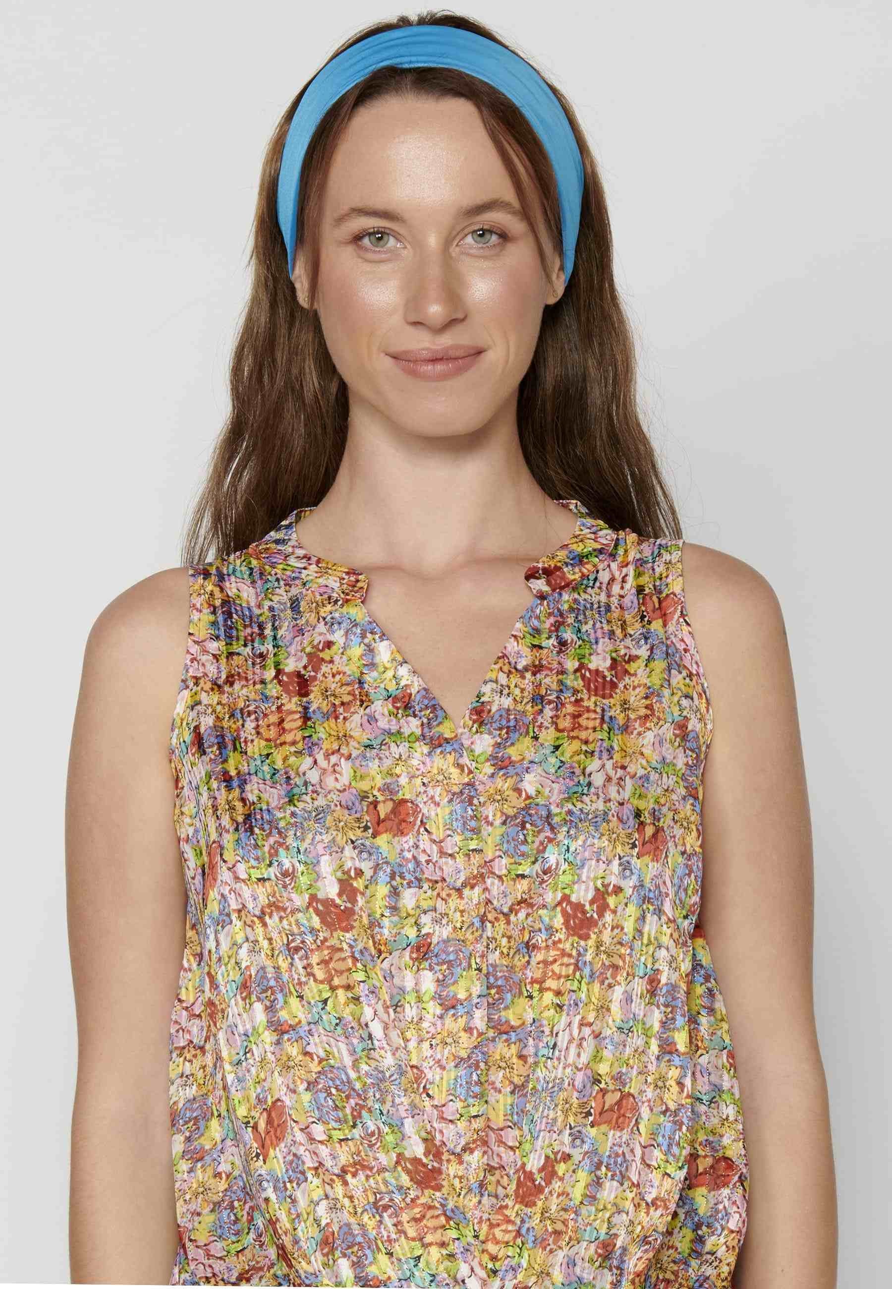 Blusa sin mangas fluida color turquesa para mujer | Moda Actual
