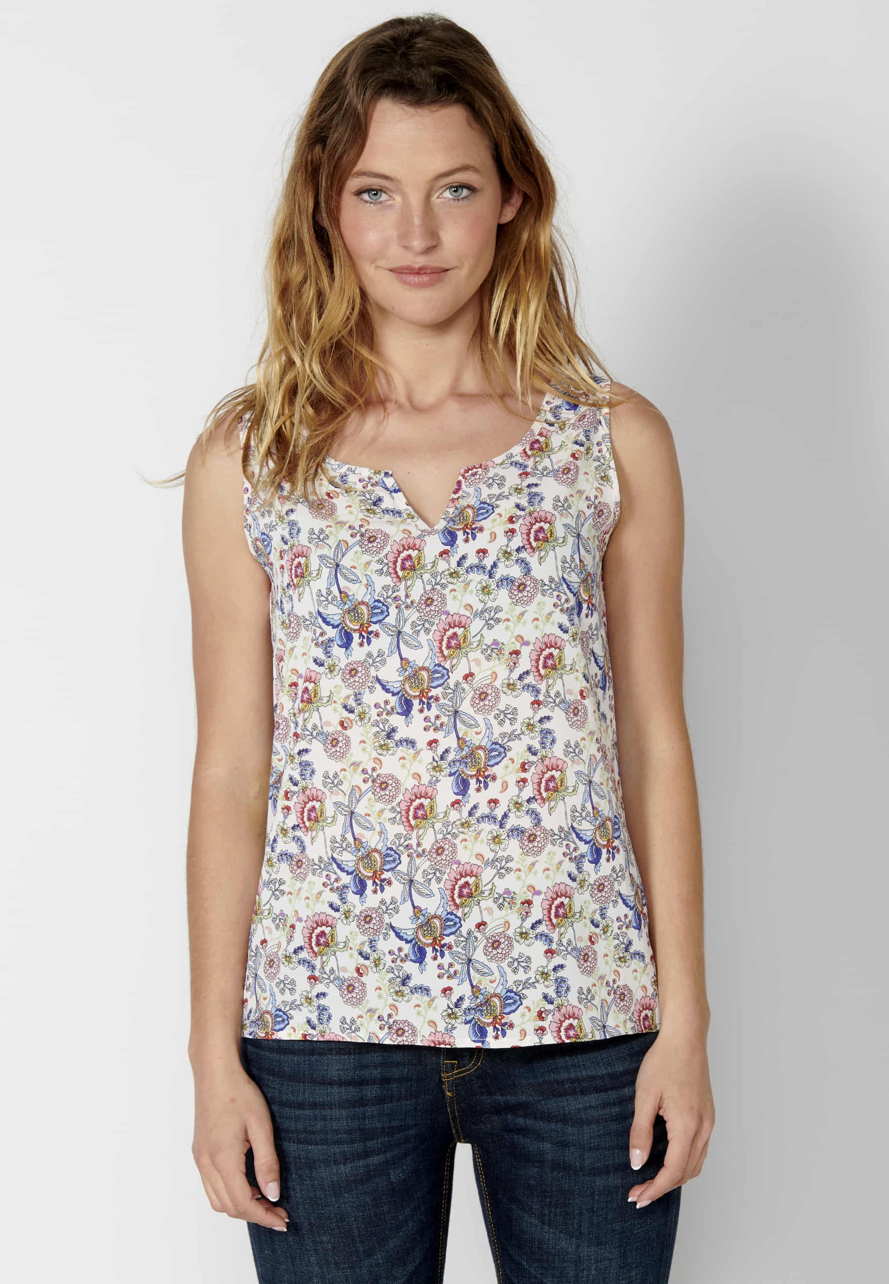 White floral print sleeveless blouse for women