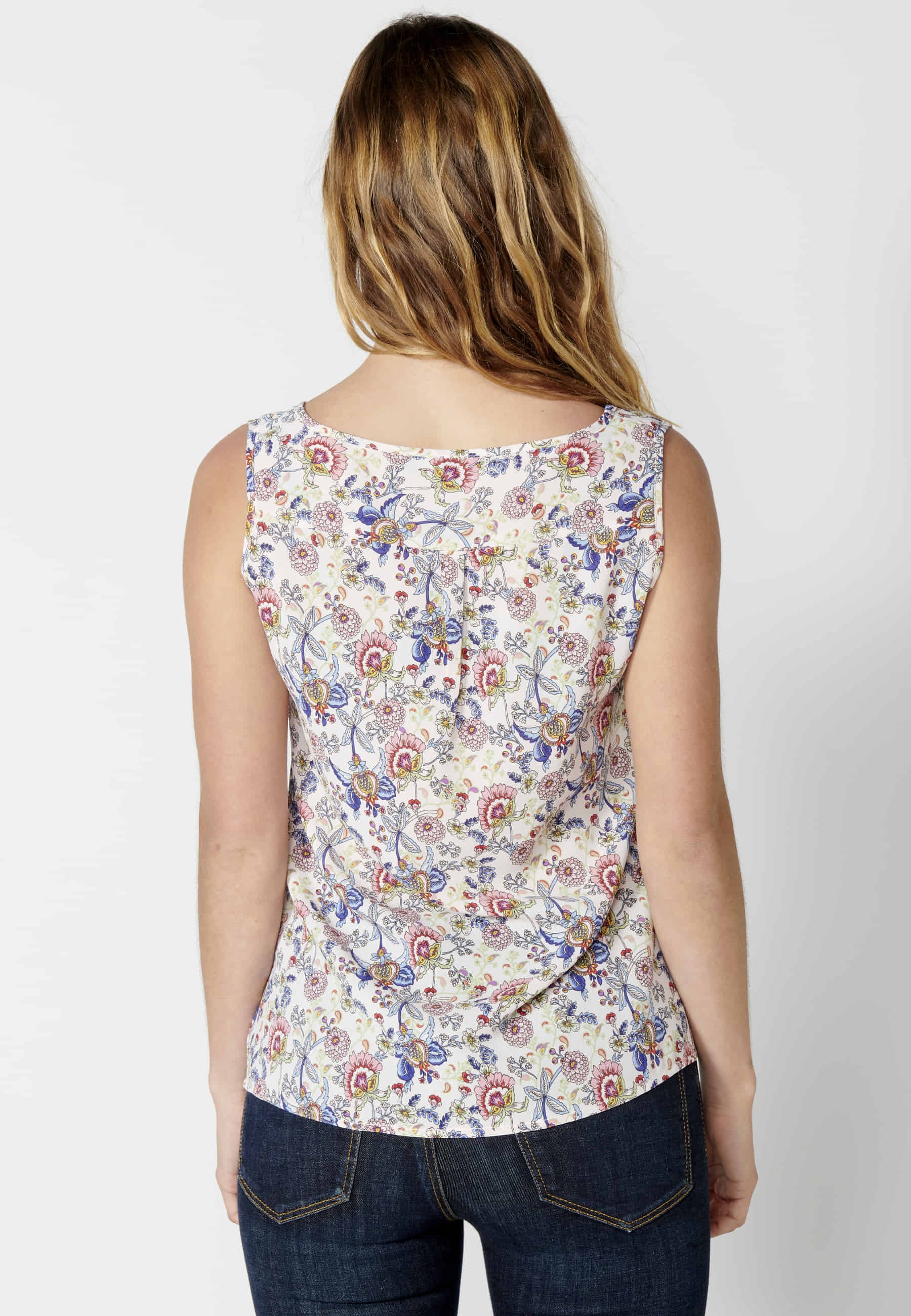 White floral print sleeveless blouse for women