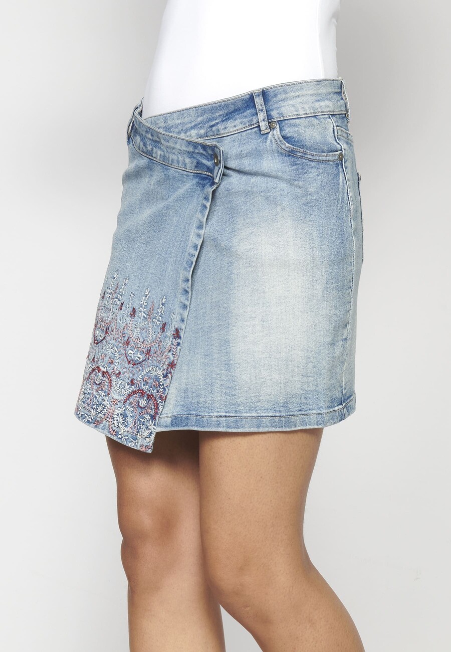 Blue short skirt with side closure and floral detail for Woman 6