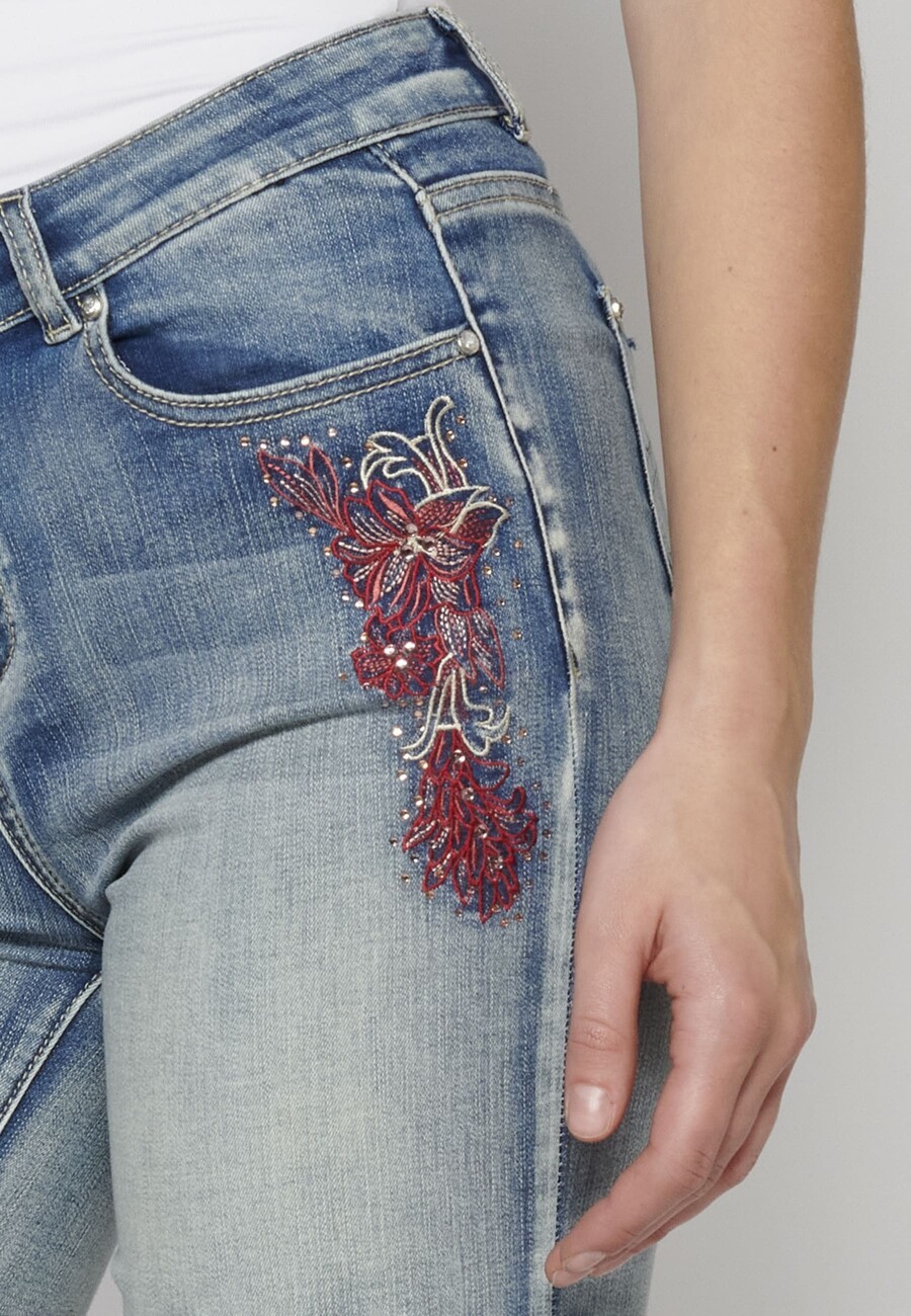Blue slim-fit shorts with floral embroidery for Woman 4