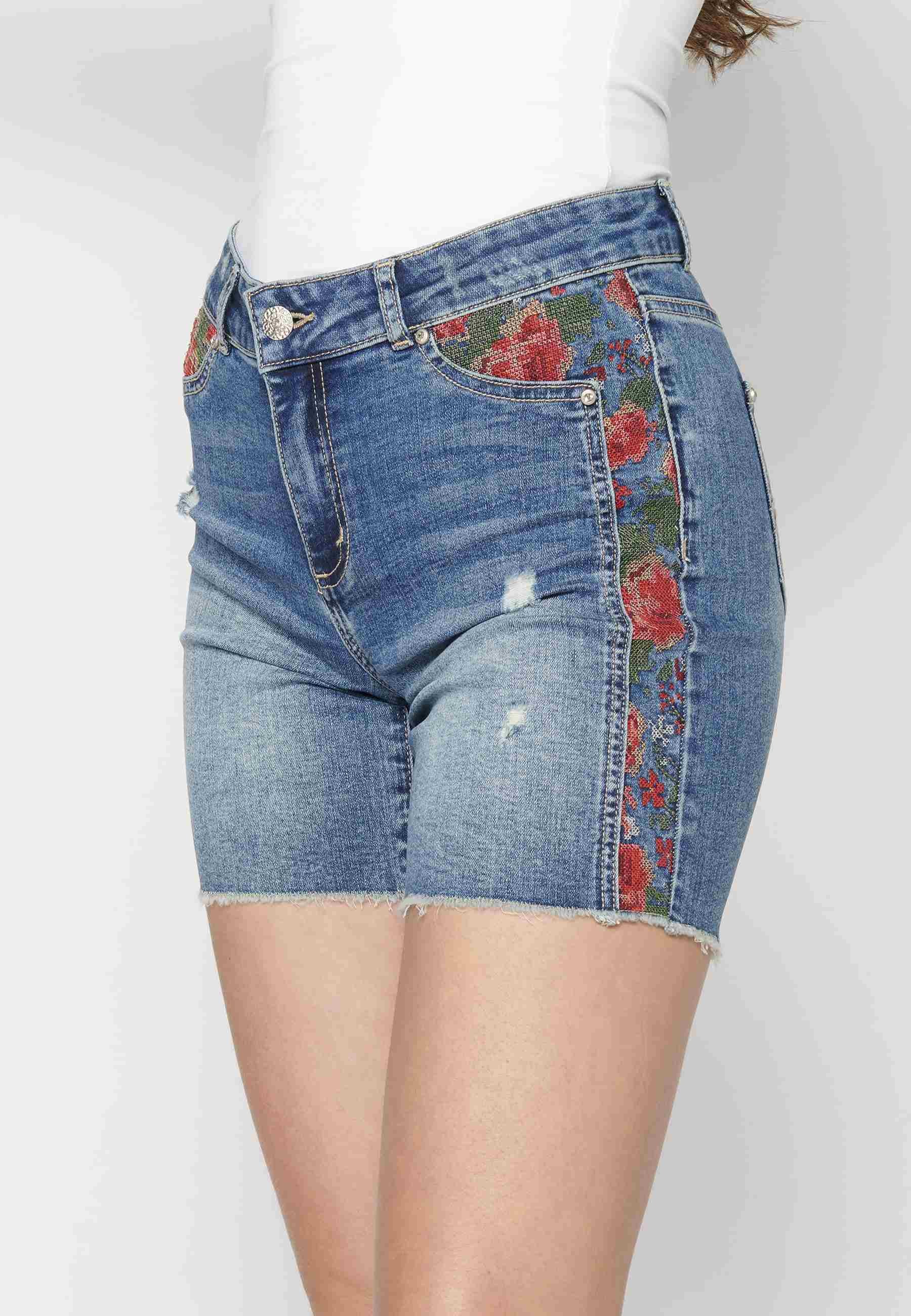 Blue shorts with floral textured detail for Woman