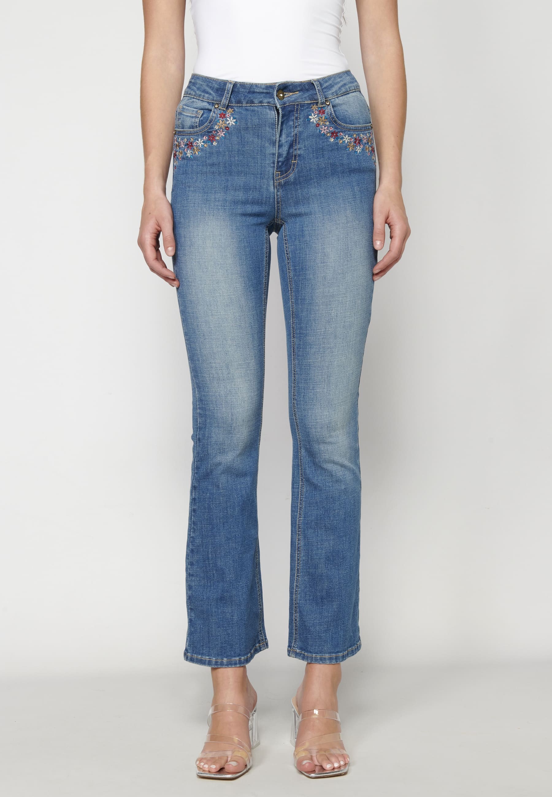 Flared jeans with floral details for Woman
