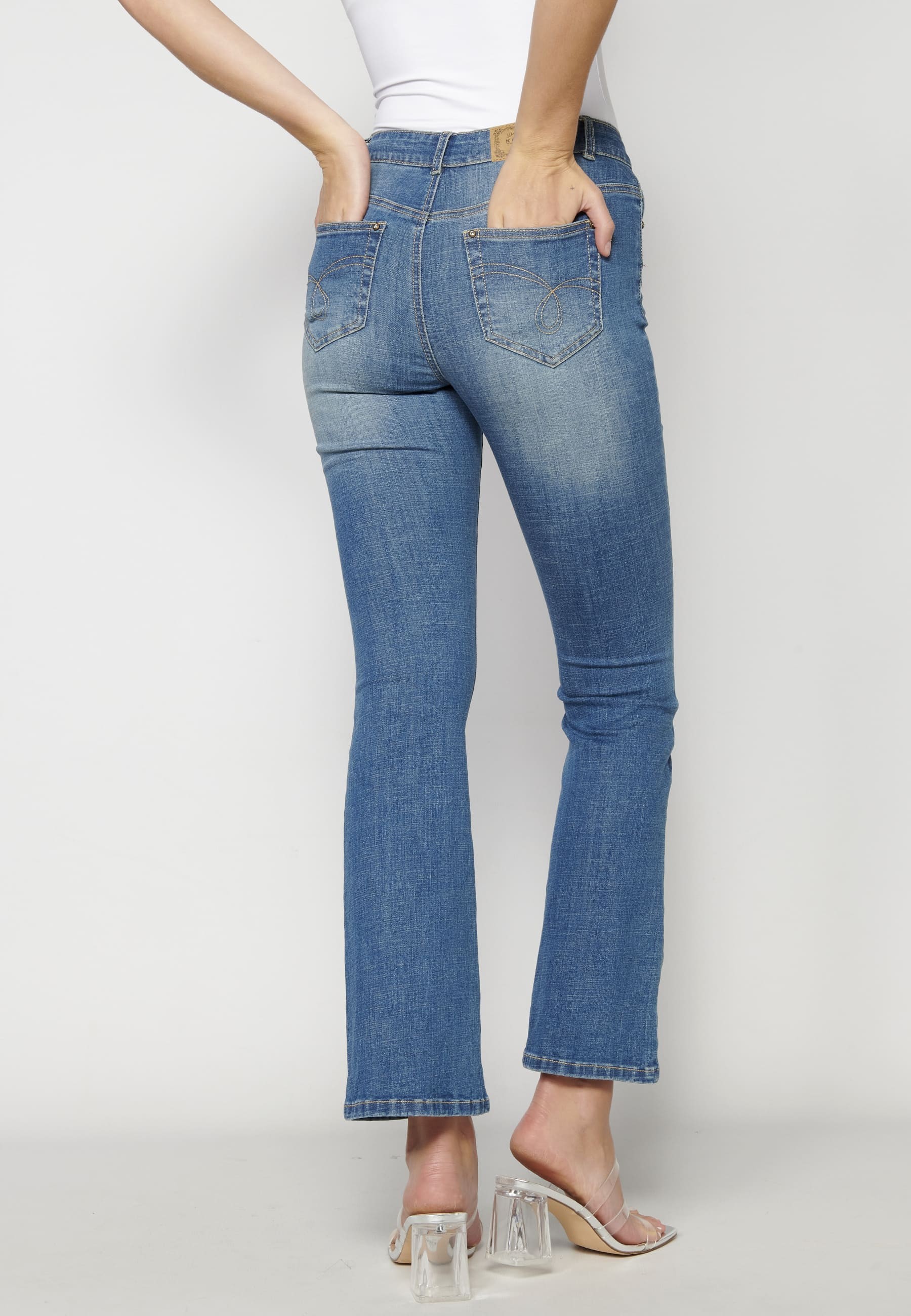 Flared jeans with floral details for Woman