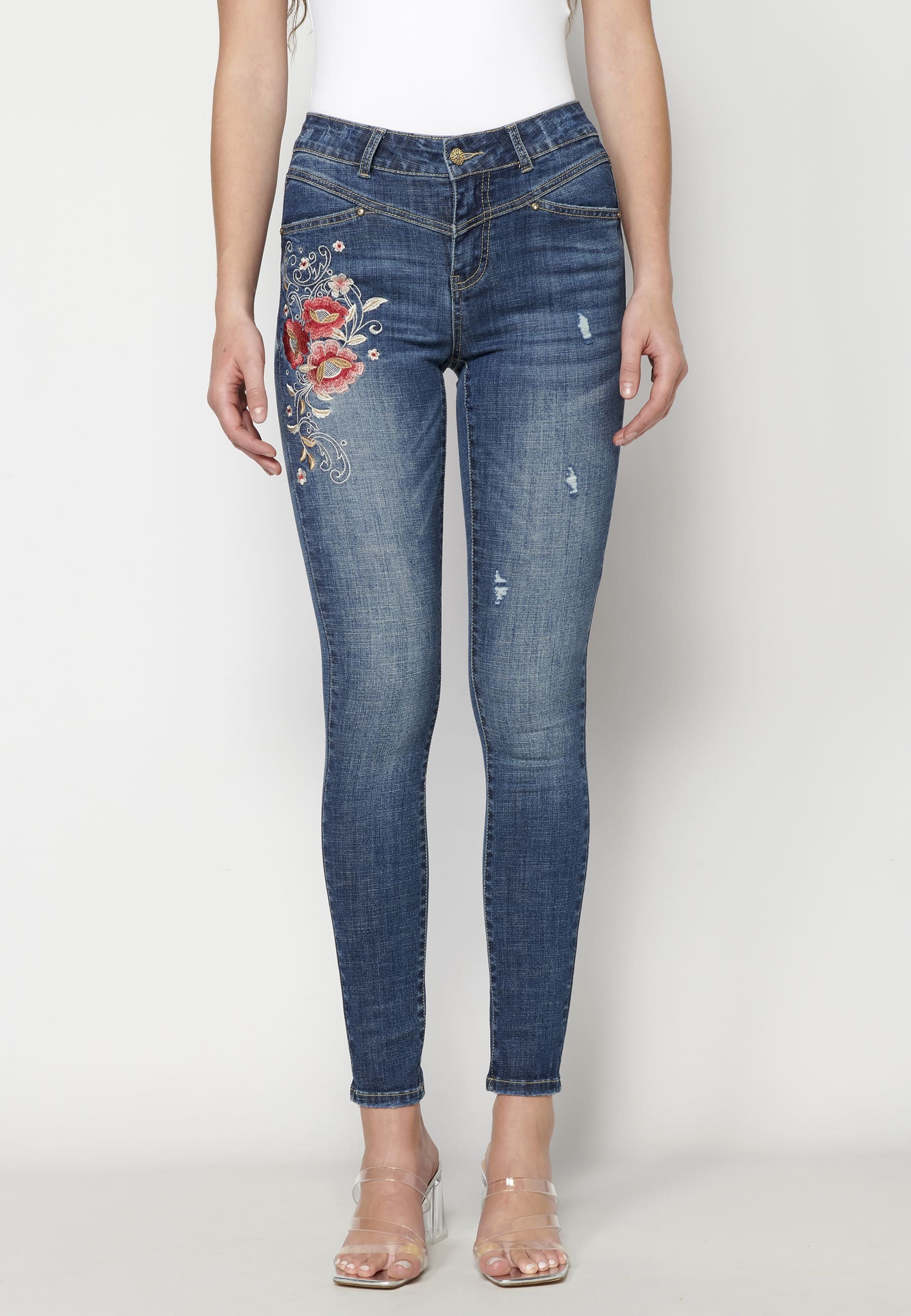 Blaue Jeans mit floralen Details für Damen