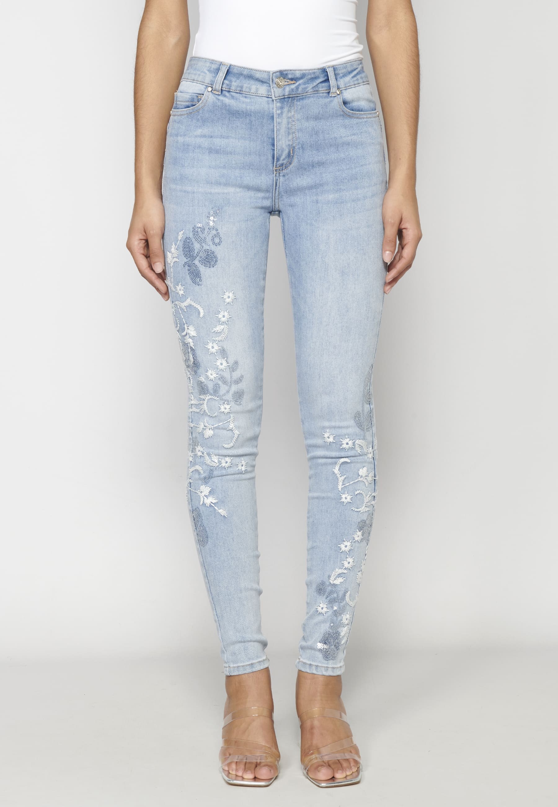 Pantalons texans amb detalls brodats color Blau per a Dona