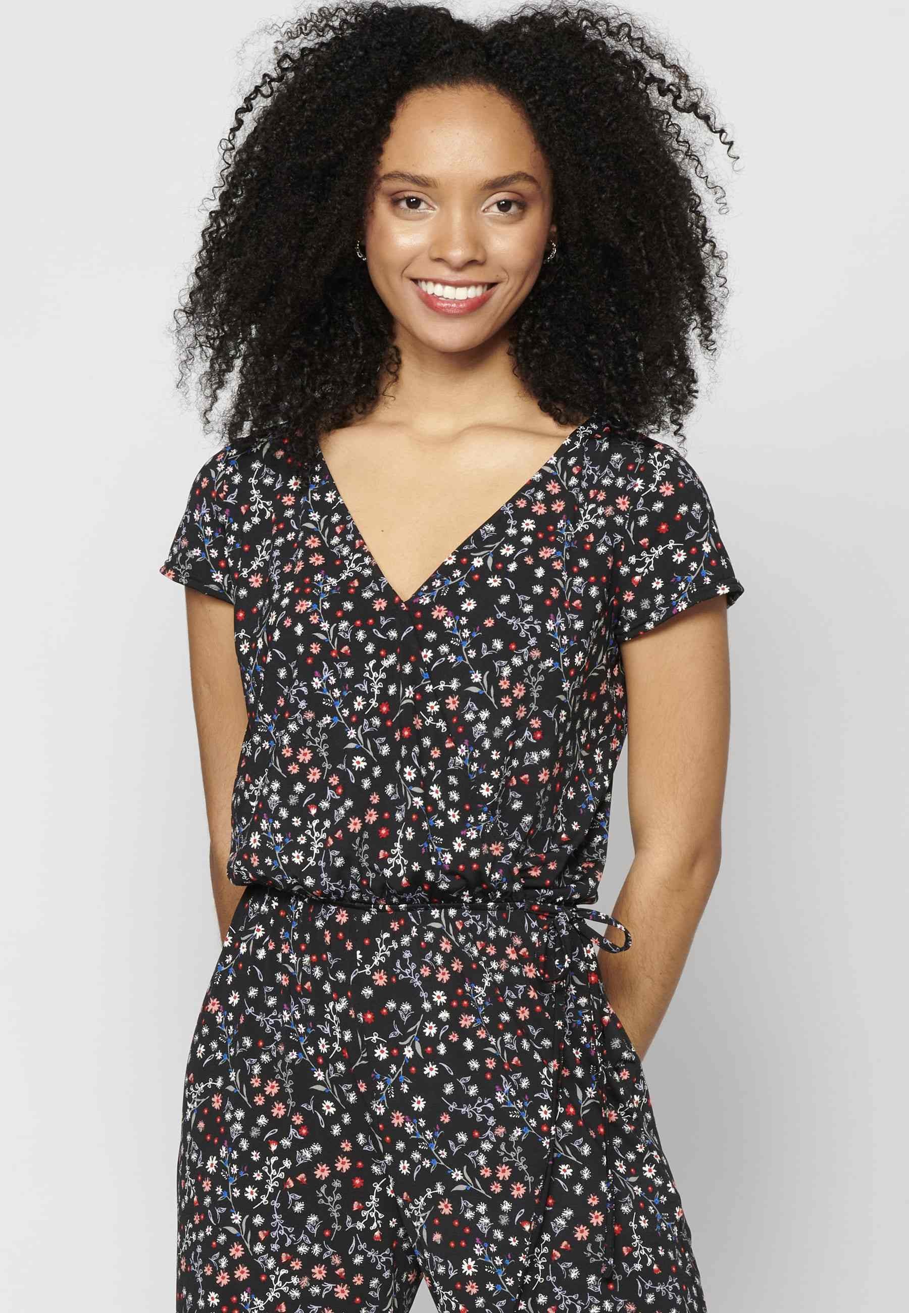 Vestido largo tipo mono de pantalón largo y manga corta con estampado floral color negro para mujer | Moda Actual