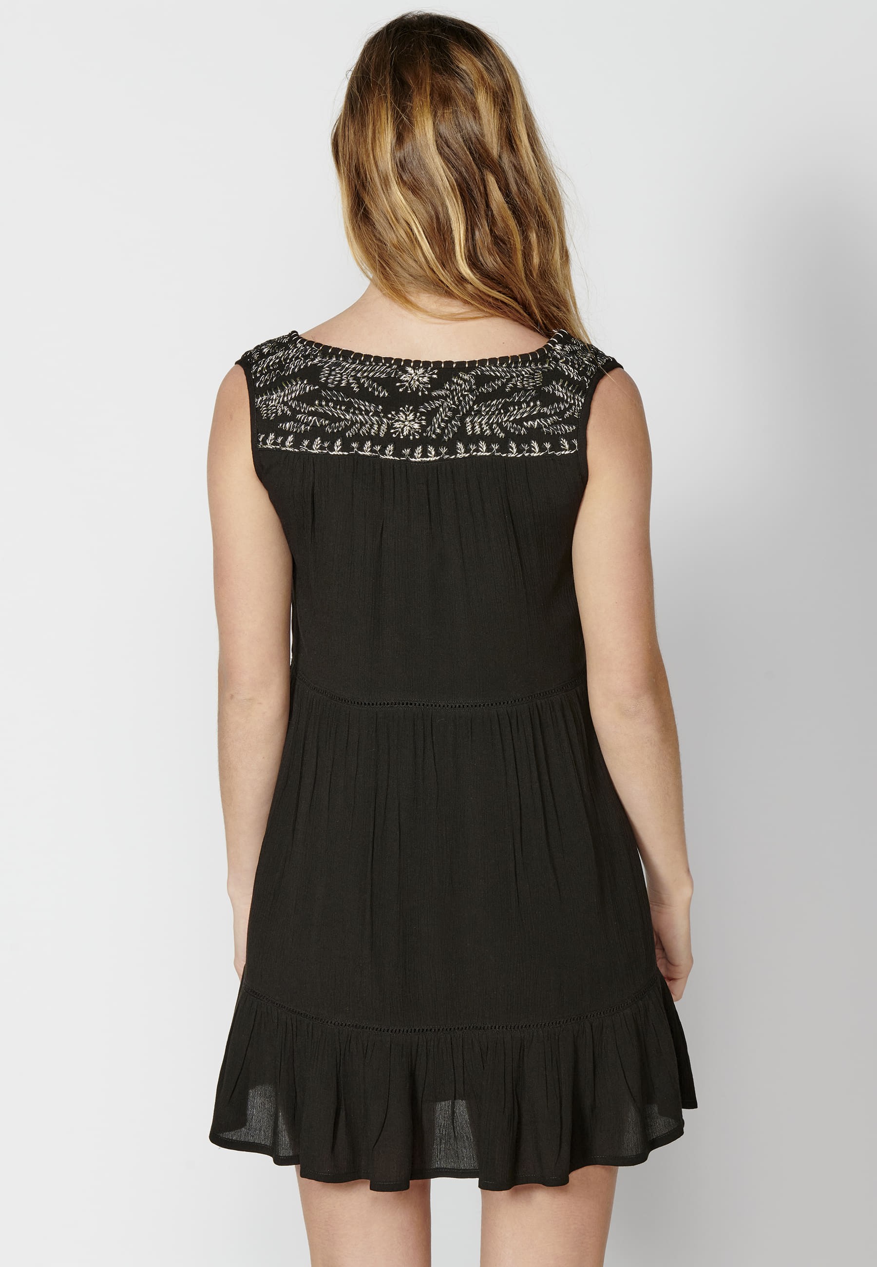 Flowy dress with straps with embroidered detail in Black color for Woman