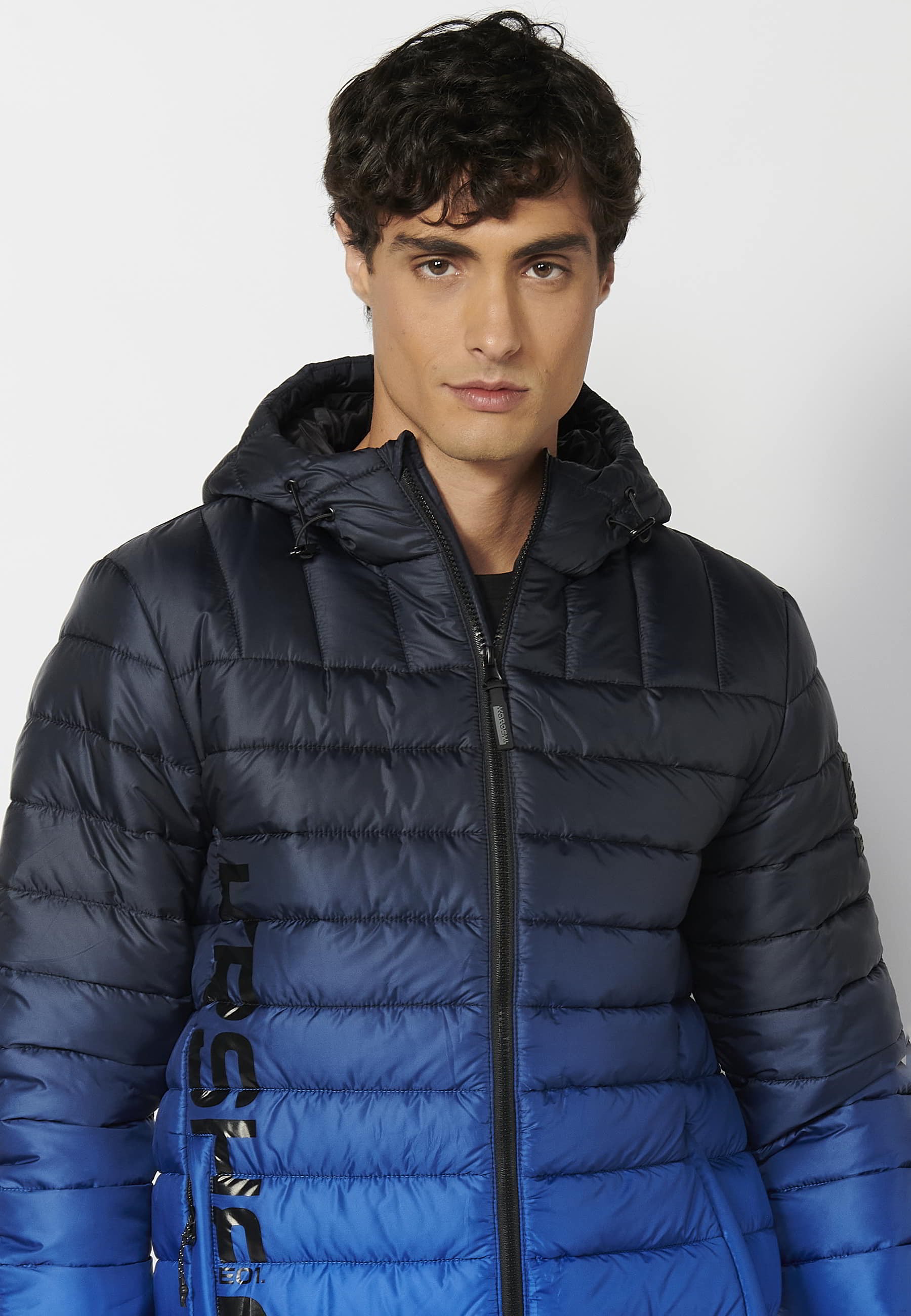 Short padded jacket with high collar with hood in Blue for Men 2