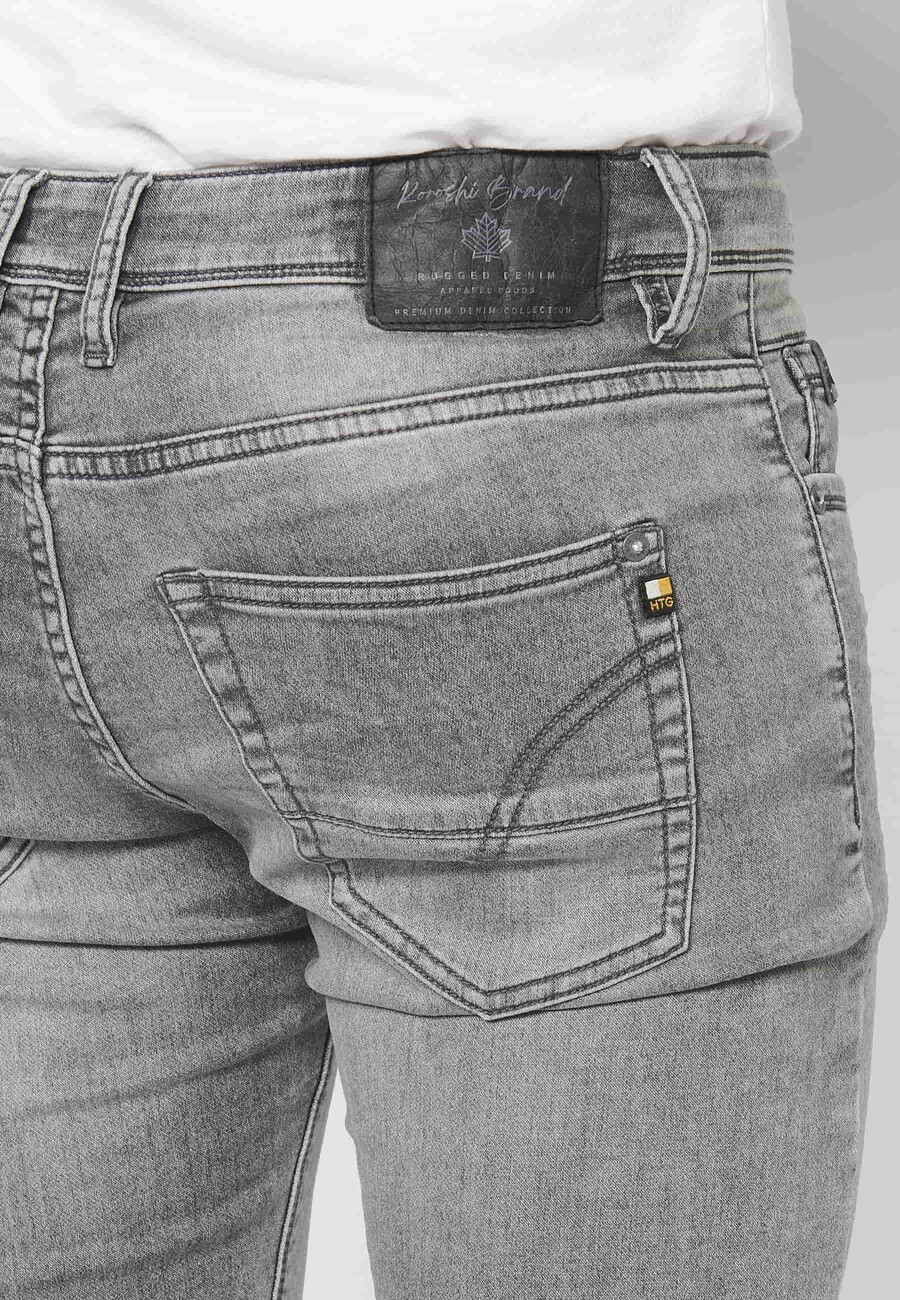 Gray slim fit jean trousers with zipper and button and five pockets in denim color for Men 7