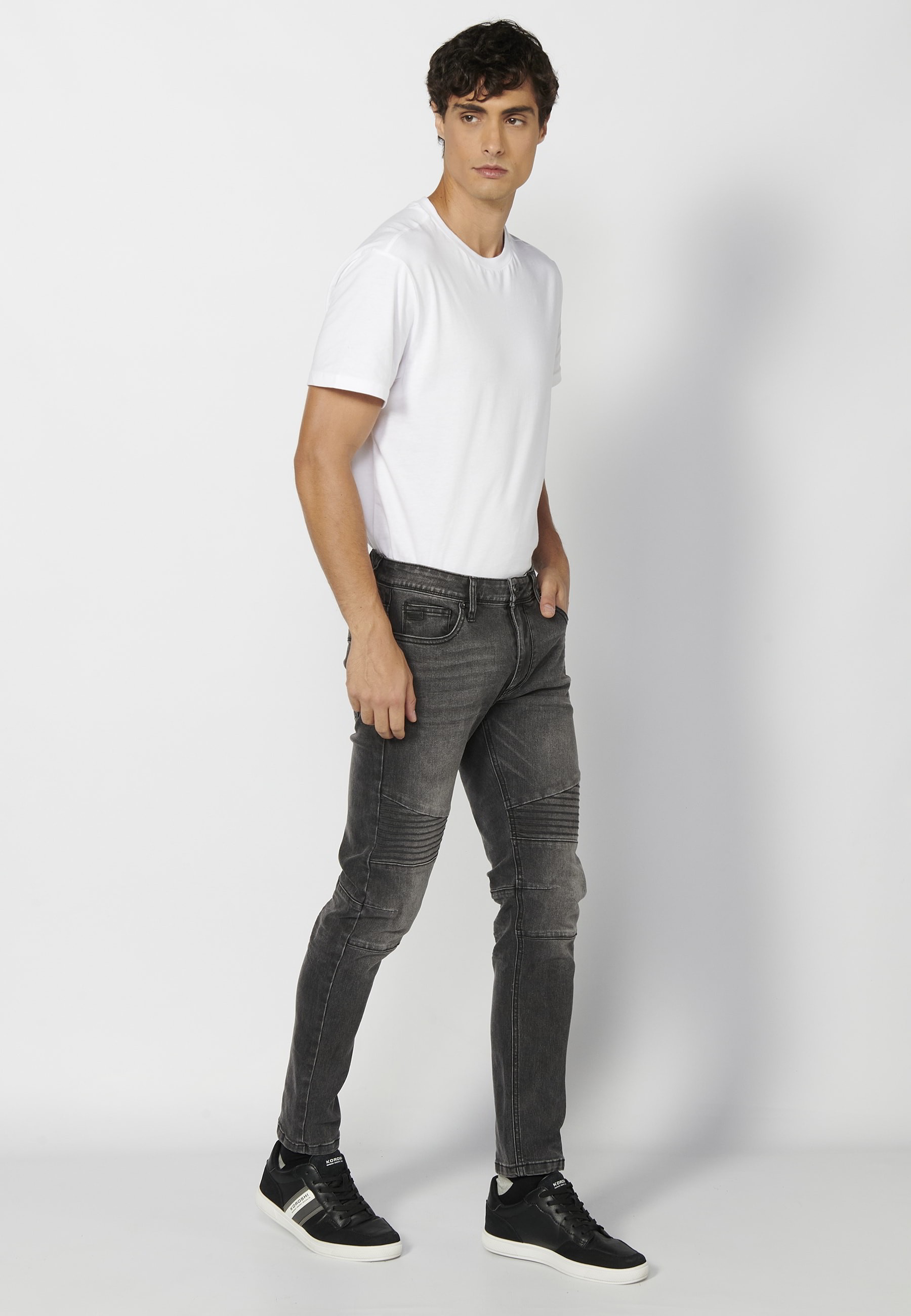 Long skinny fit pants, with five pockets, worn black color for Men