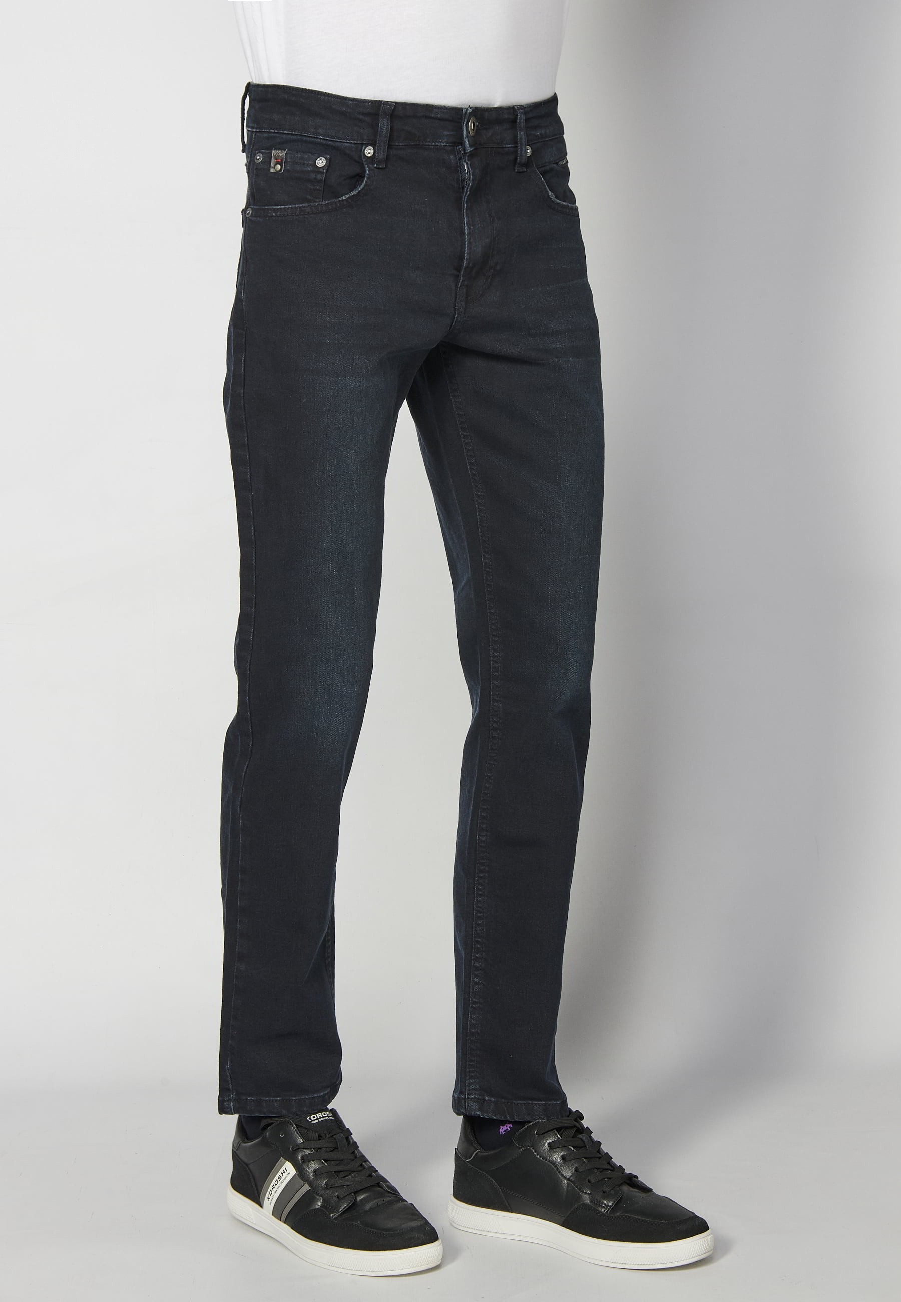 Regular fit stretch jeans with five pockets in dark blue for Men