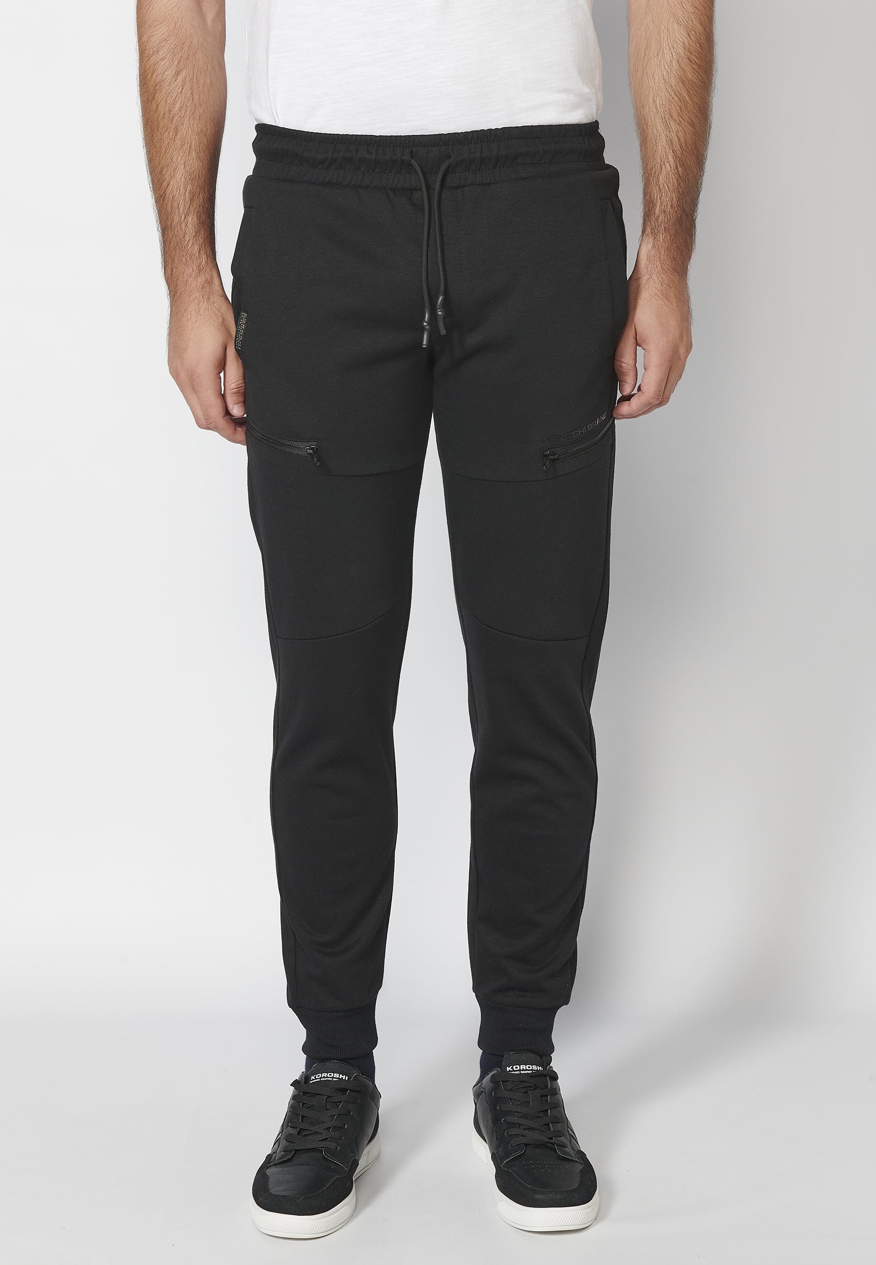 Long jogger pants with elasticated waistband and drawstring with cutouts in the knees in Black color for Men