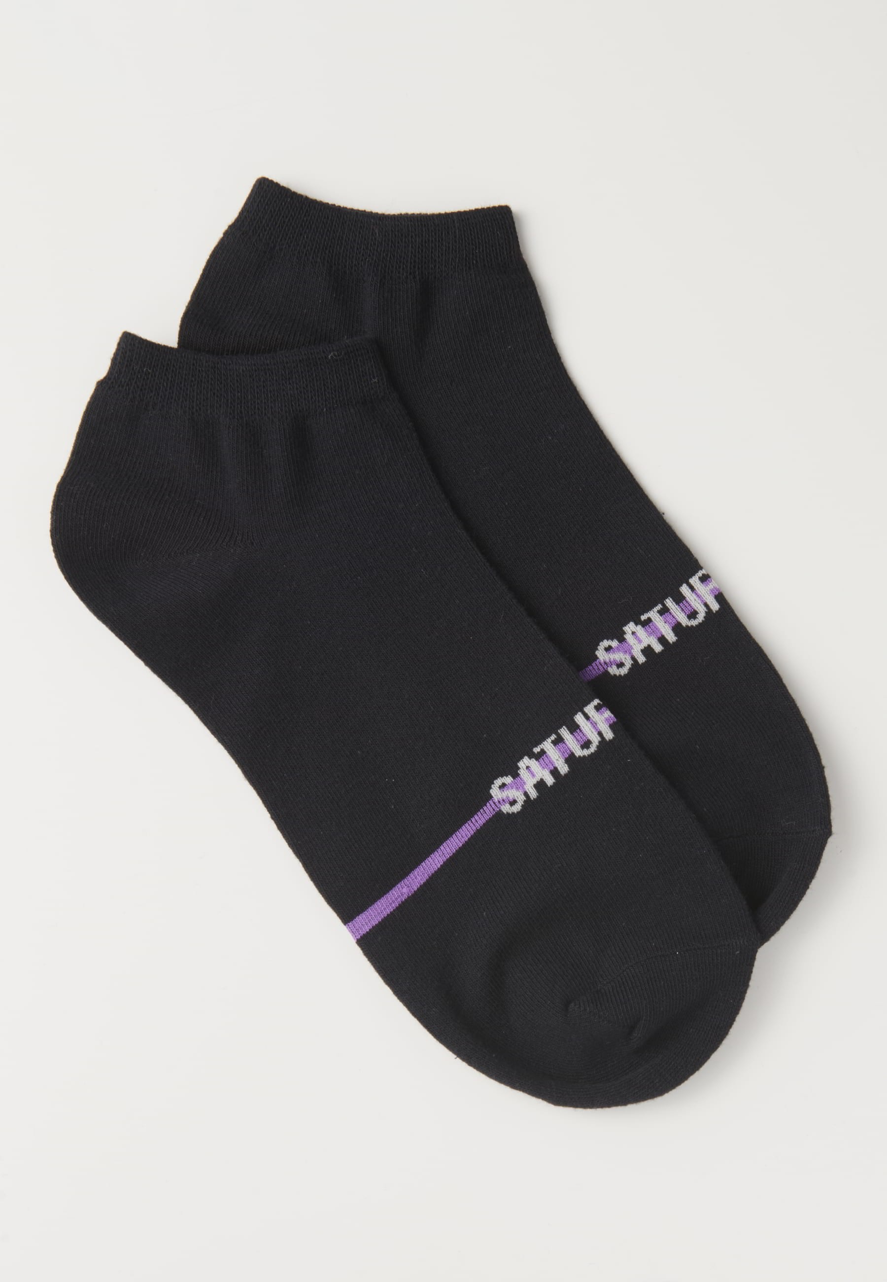Packung mit sieben Socken, eine für jeden Wochentag, verschiedene Farben für Herren