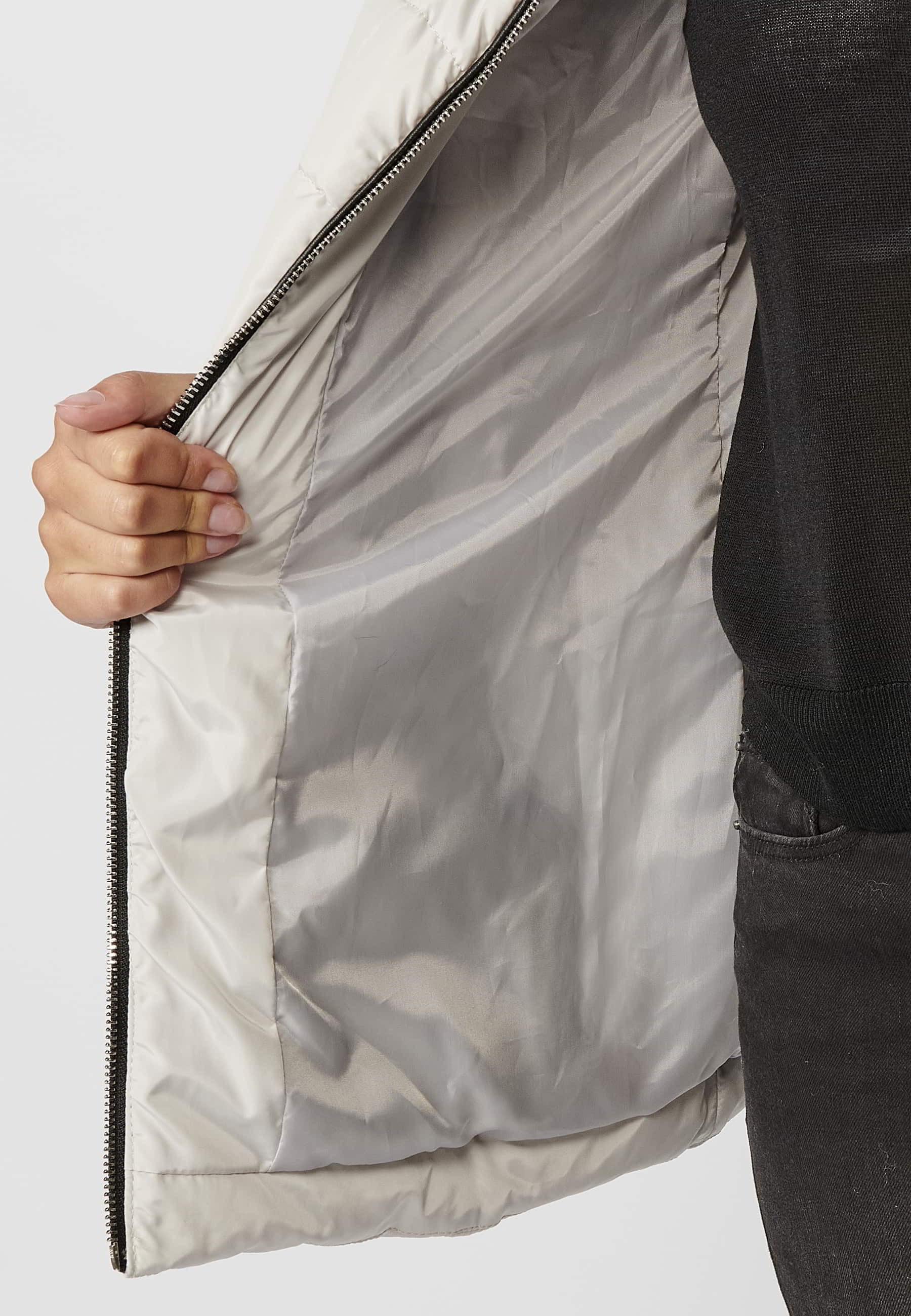 Abrigo acolchado de manga larga con capucha de pelo sintético desmontable color gris para mujer | Moda Actual