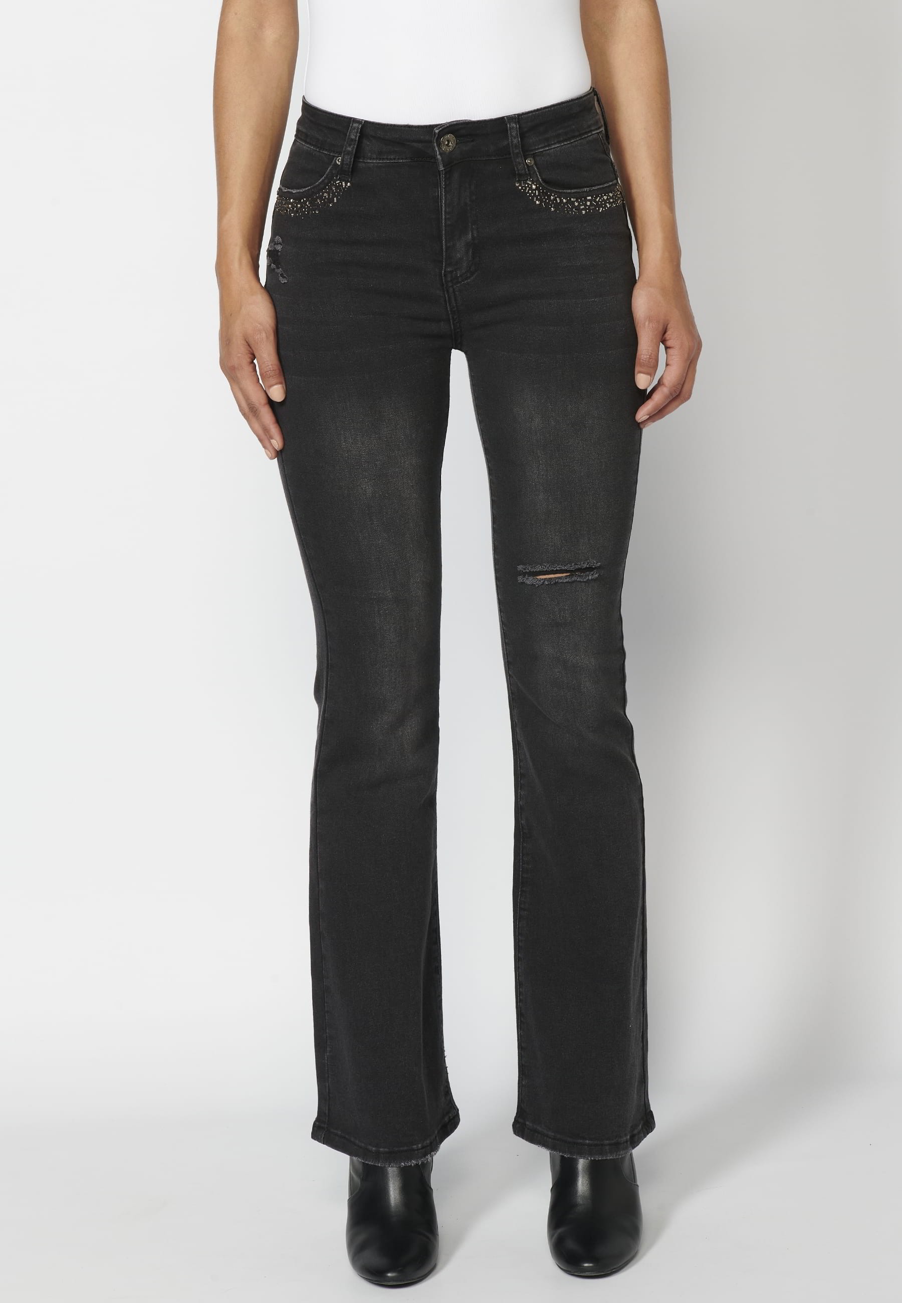 Long denim pants with details in the pockets in Black color for Woman