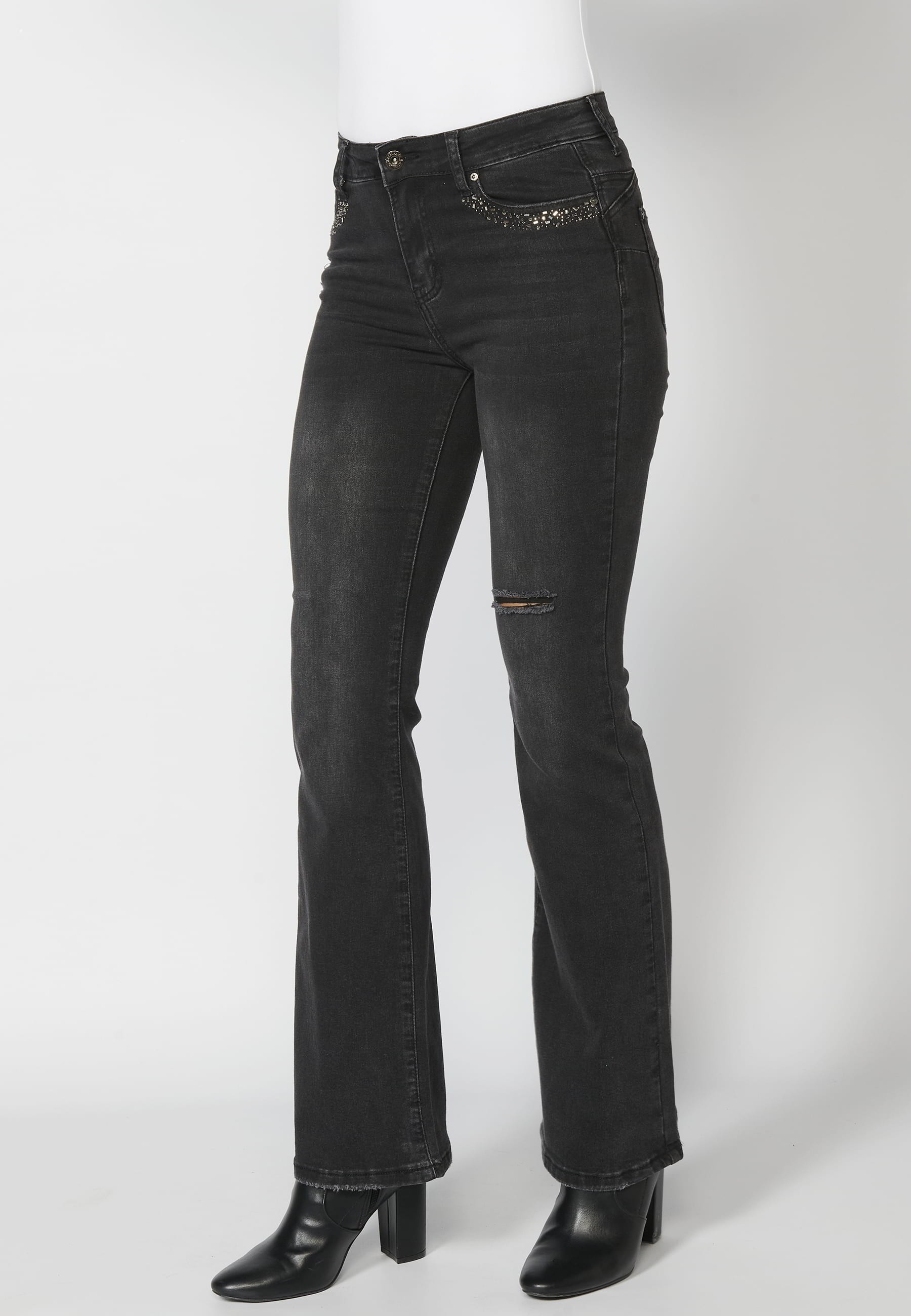 Pantalons llargs denim amb detalls a les butxaques color Negre per a Dona