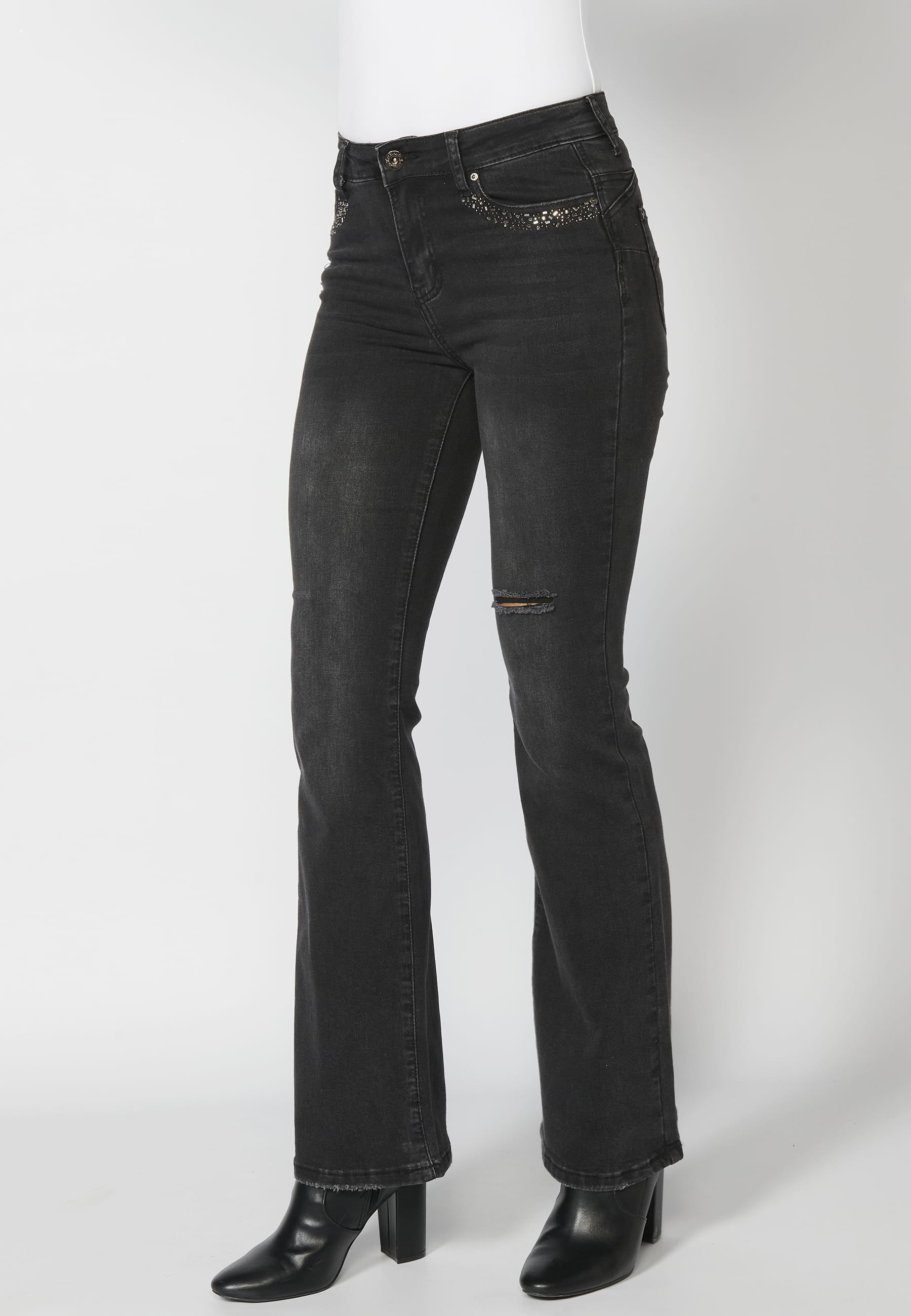 Long denim pants with details in the pockets in Black color for Woman