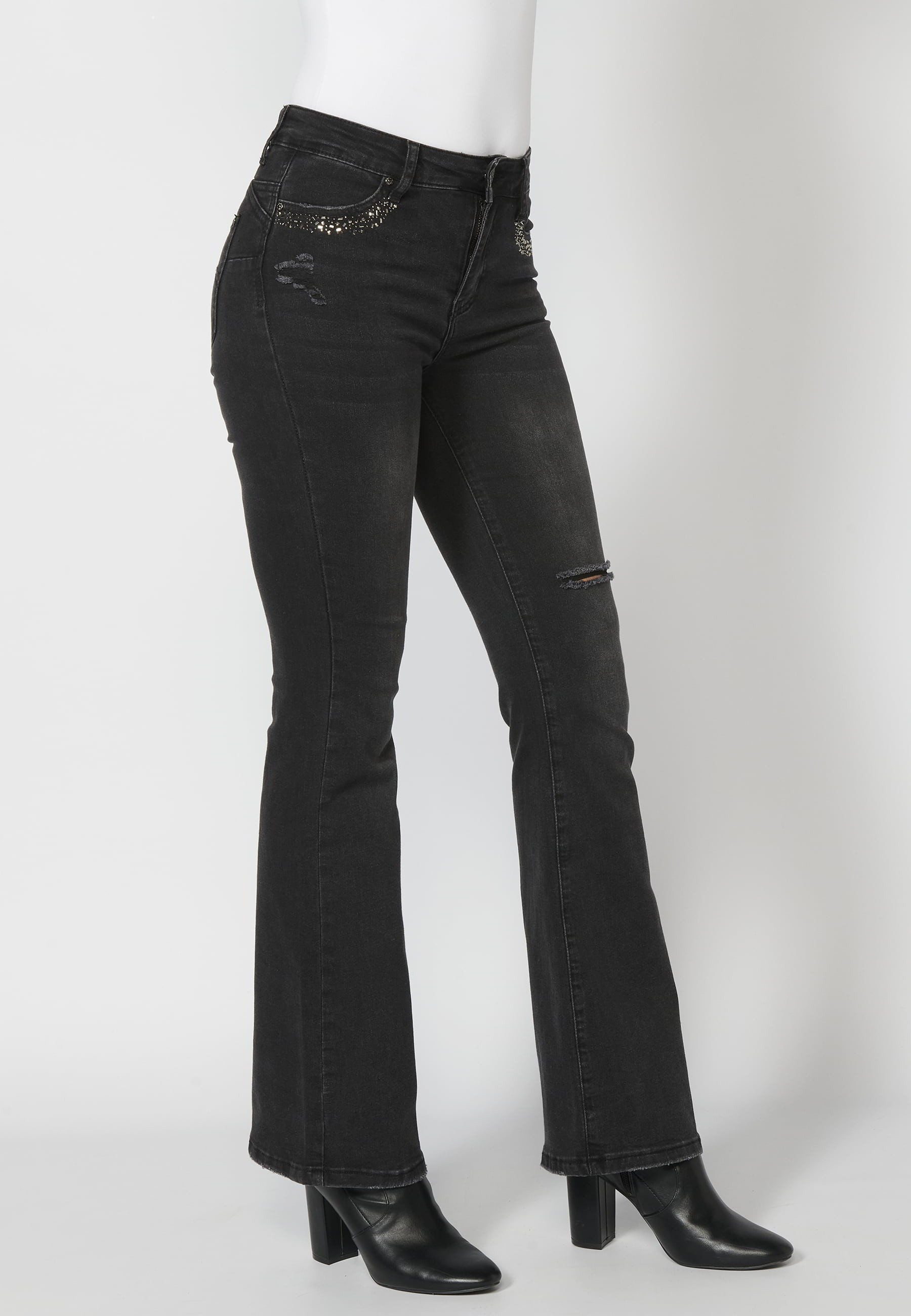 Long denim pants with details in the pockets in Black color for Woman