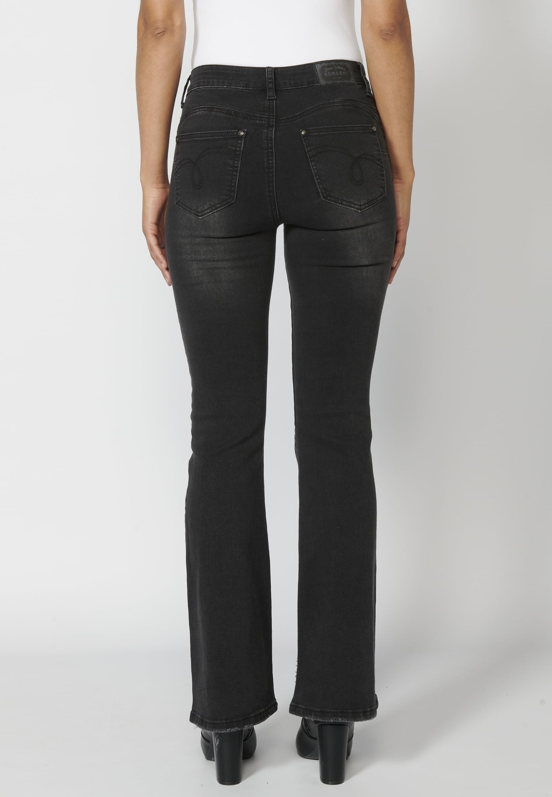 Pantalon long en jean avec détails dans les poches de couleur Noir pour Femme