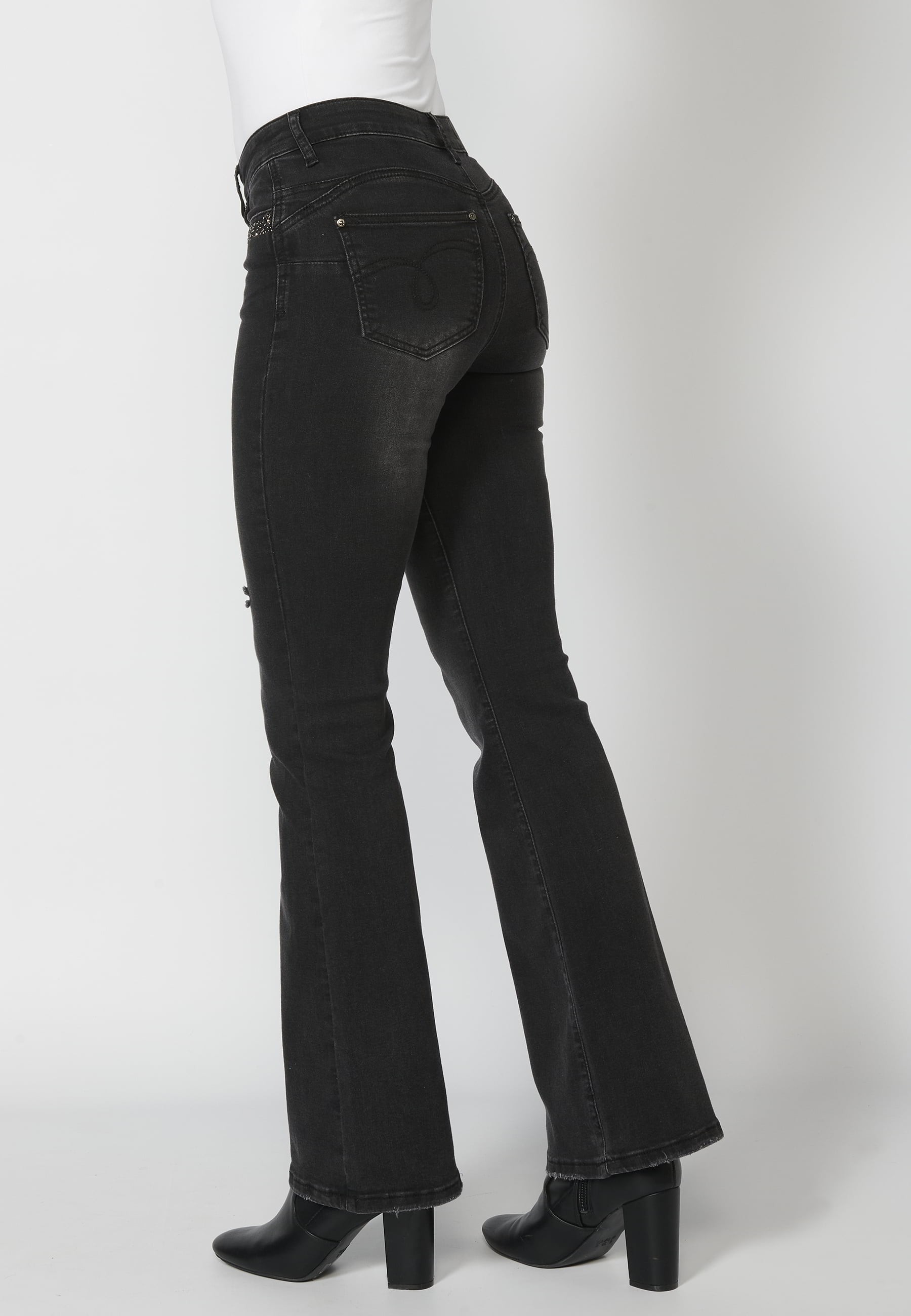 Long denim pants with details in the pockets in Black color for Woman
