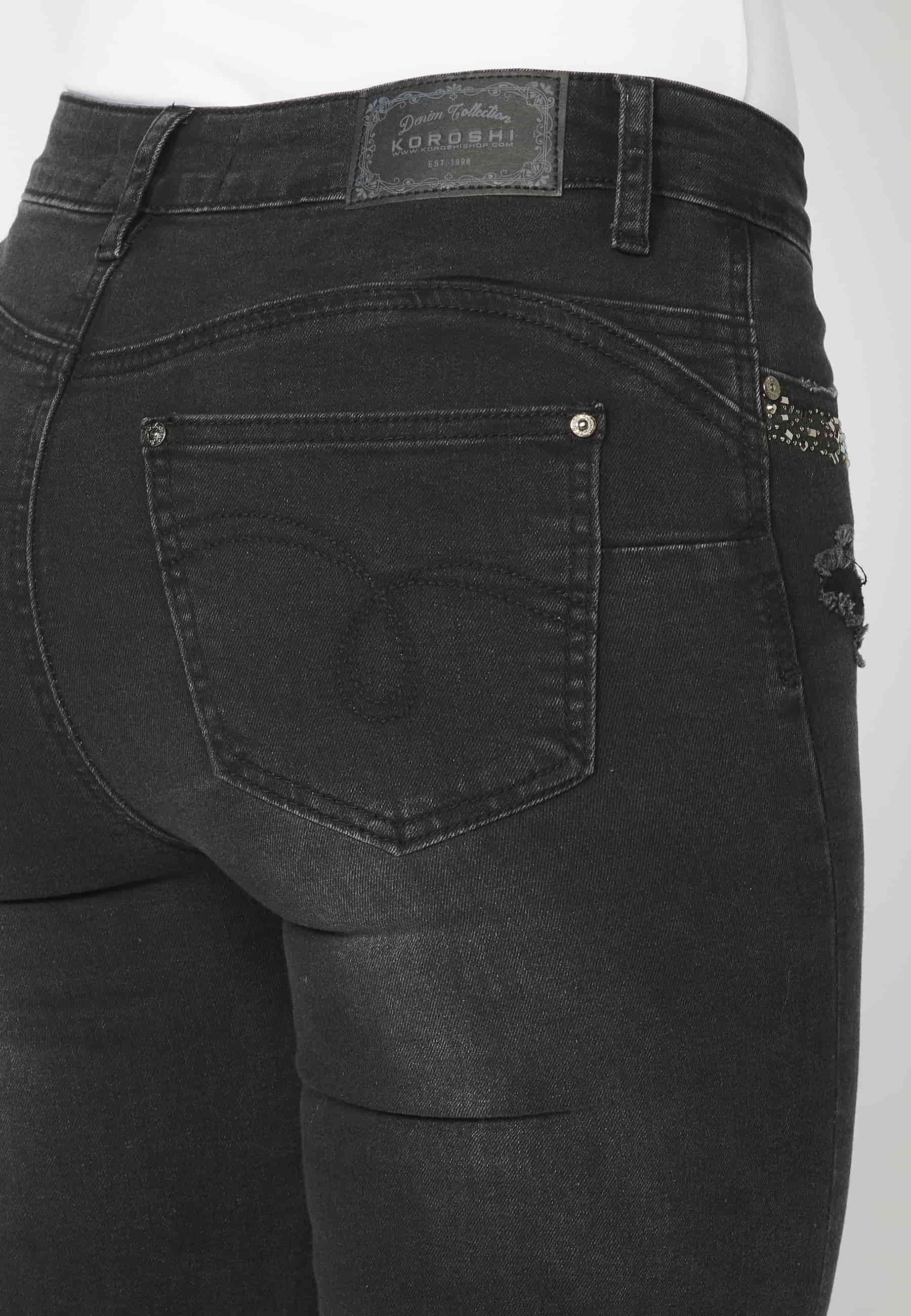 Long denim pants with details in the pockets in Black color for Woman