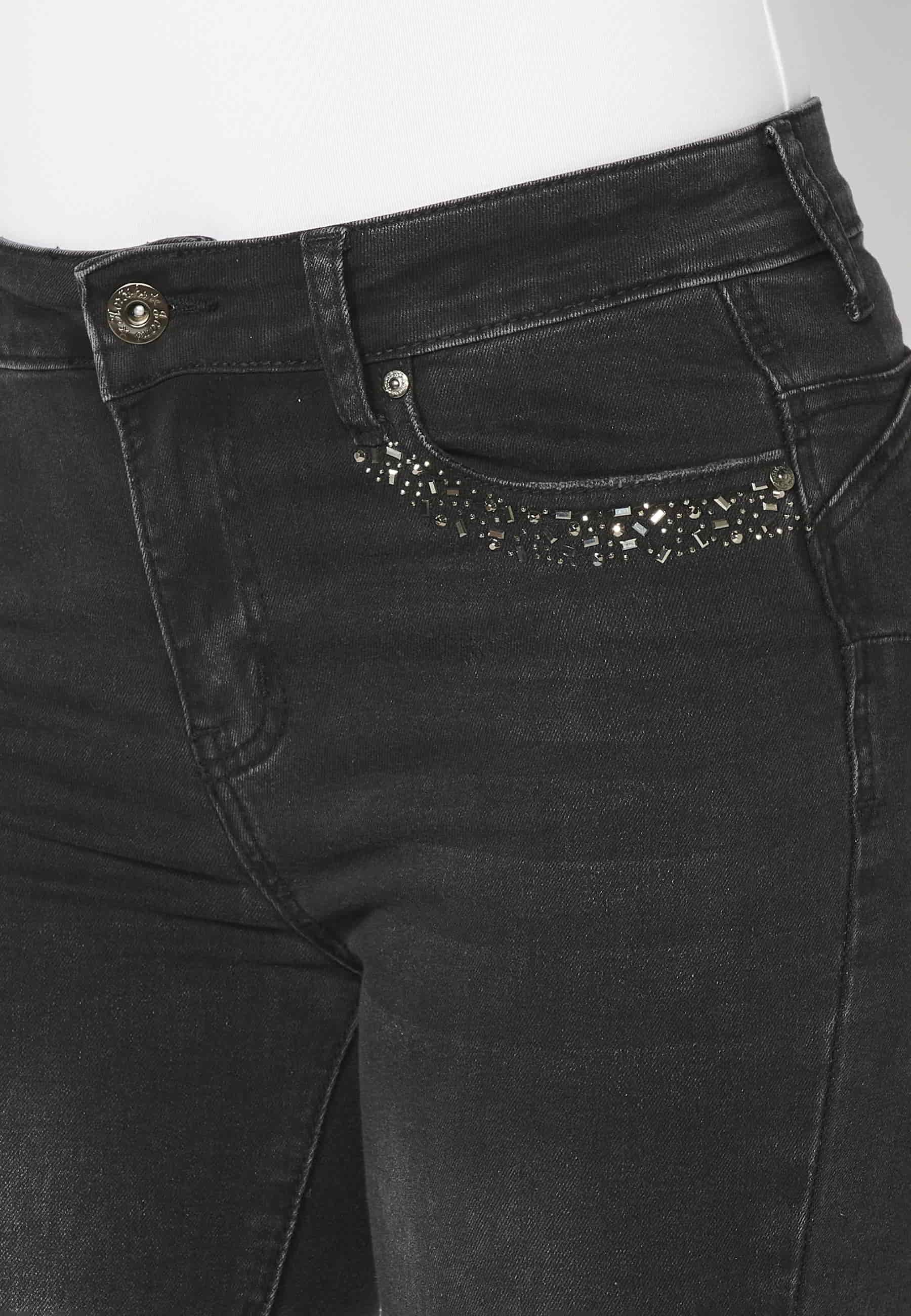 Long denim pants with details in the pockets in Black color for Woman