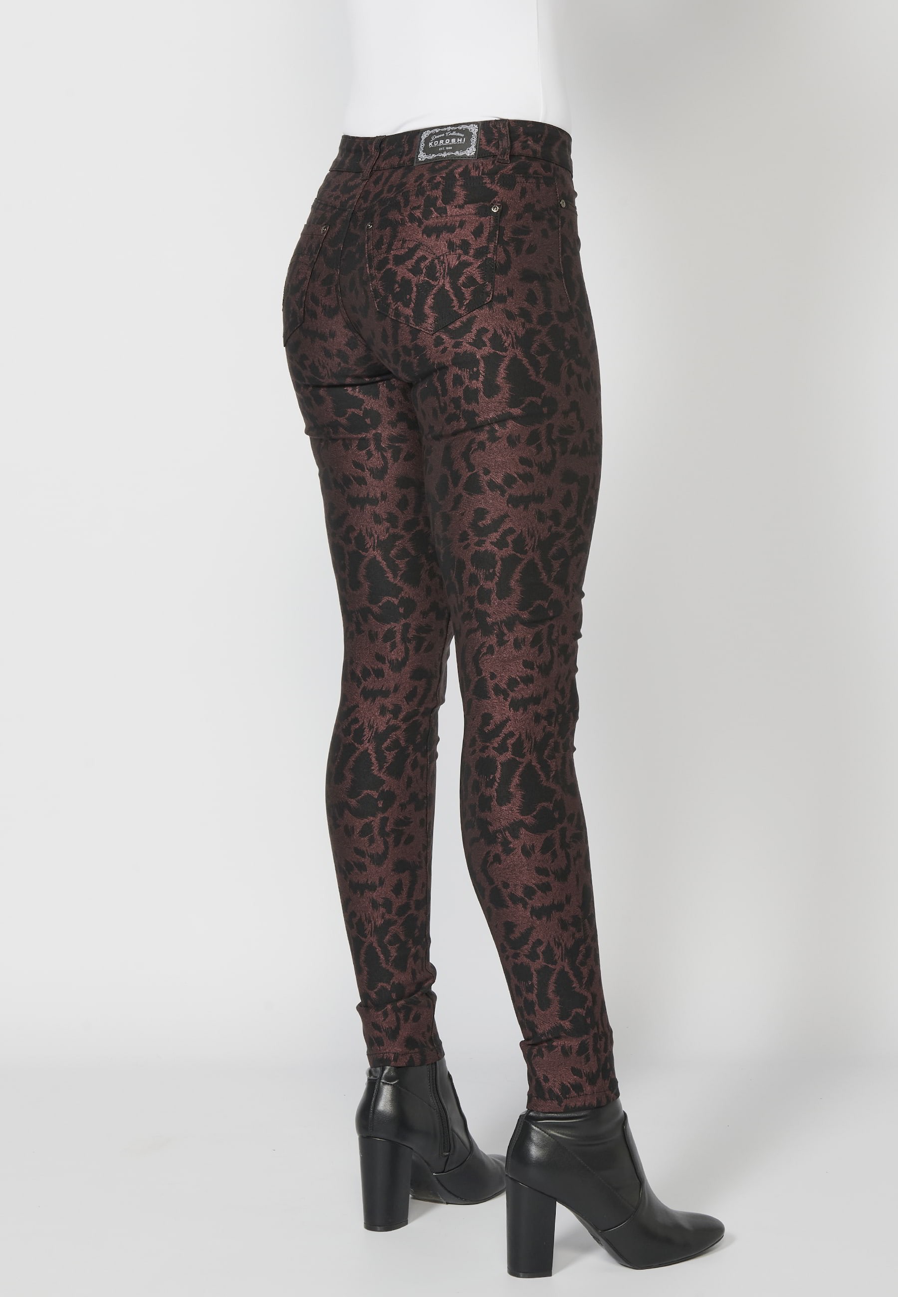 Pantalon long moulant avec imprimé animalier couleur Noir pour Femme