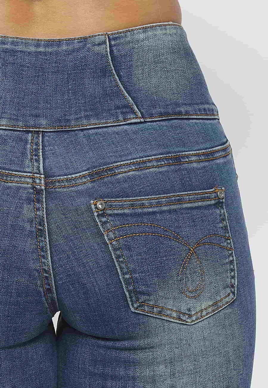 Pantalón largo denim slim fit con cintura fajín y detalles rotos color azul para mujer | Moda Actual 8