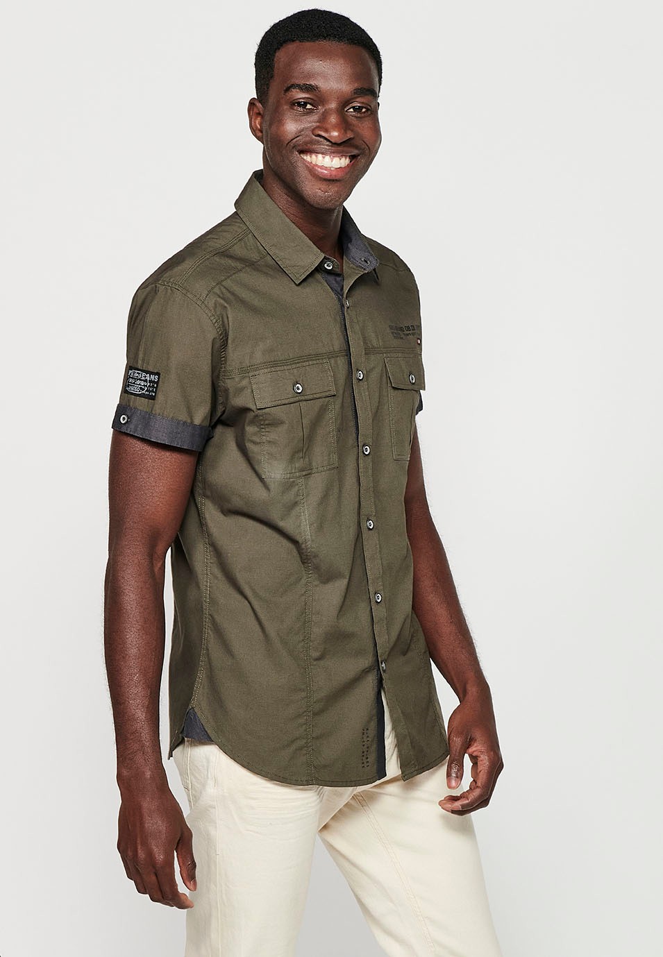 Short Sleeve Cotton Shirt with Button Front Closure and Front Flap Pockets in Olive Color for Men 1