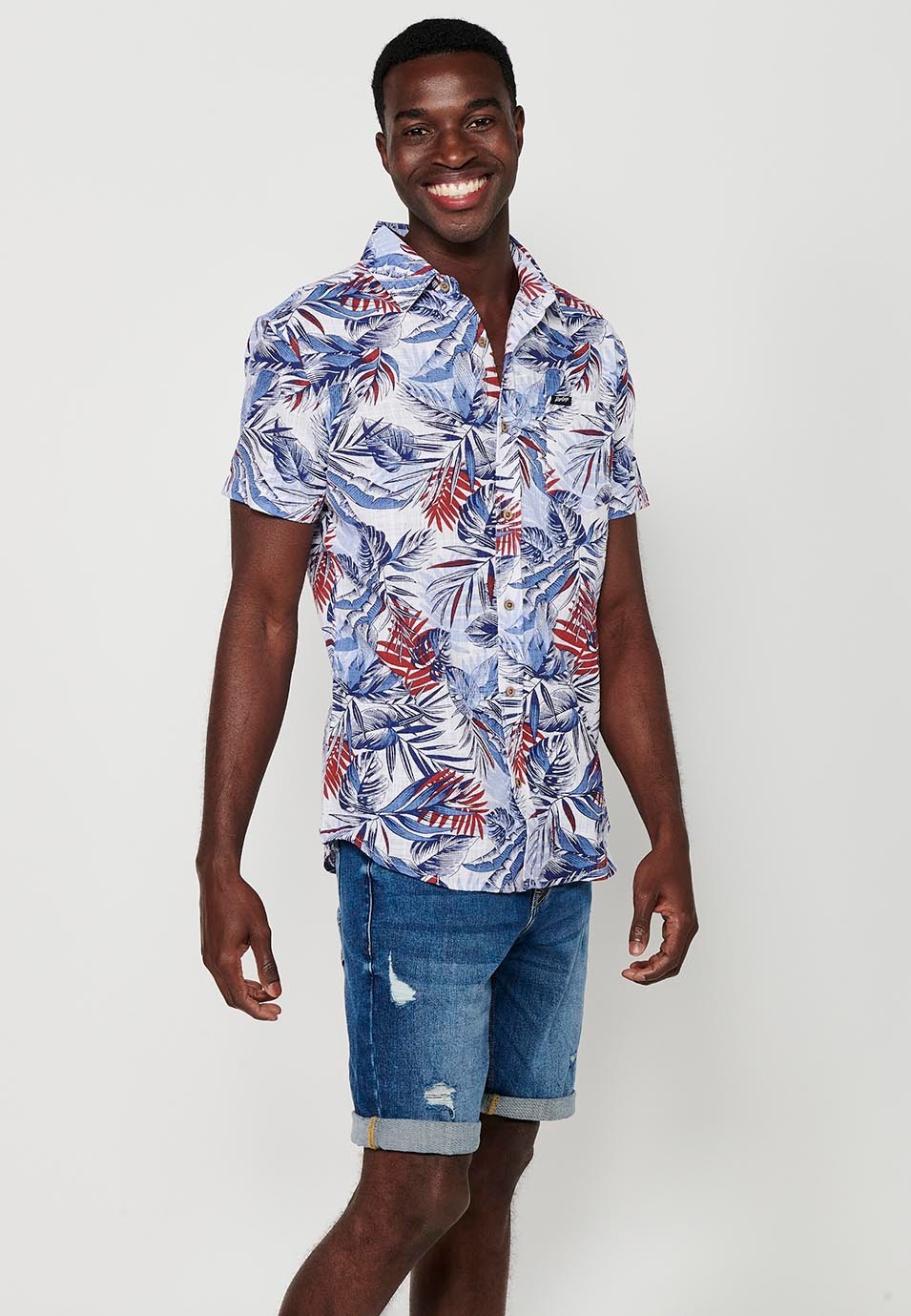 Short-sleeved Cotton T-shirt with Button Front Closure and Blue Tropical Print for Men