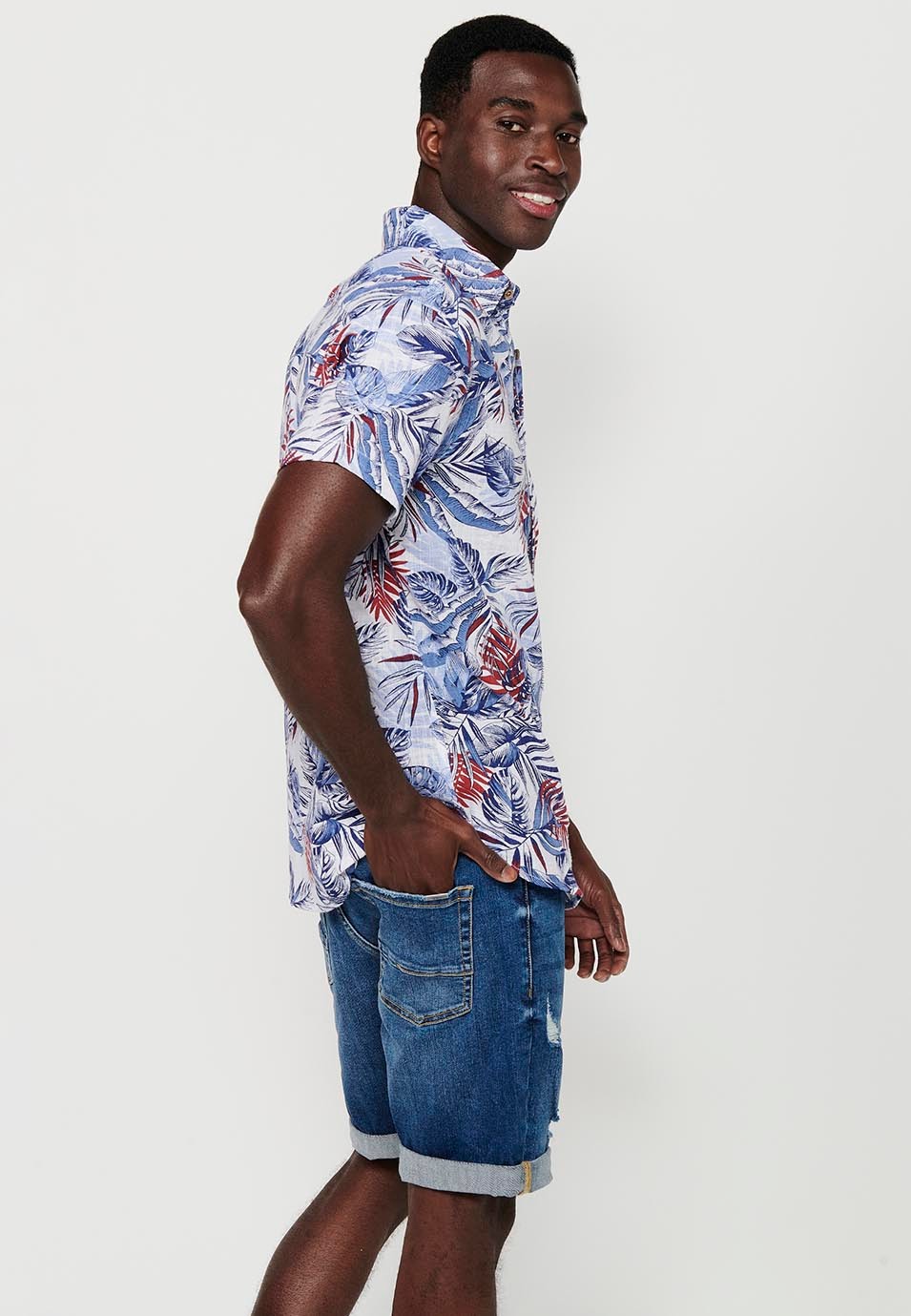 Short-sleeved Cotton T-shirt with Button Front Closure and Blue Tropical Print for Men