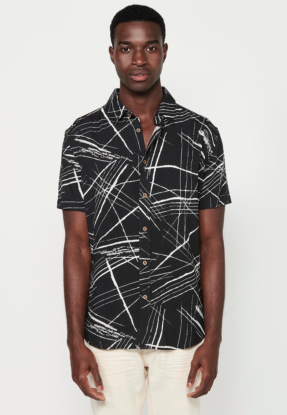 Short Sleeve Shirt with Button Front Closure and Black Tropical Print for Men 1